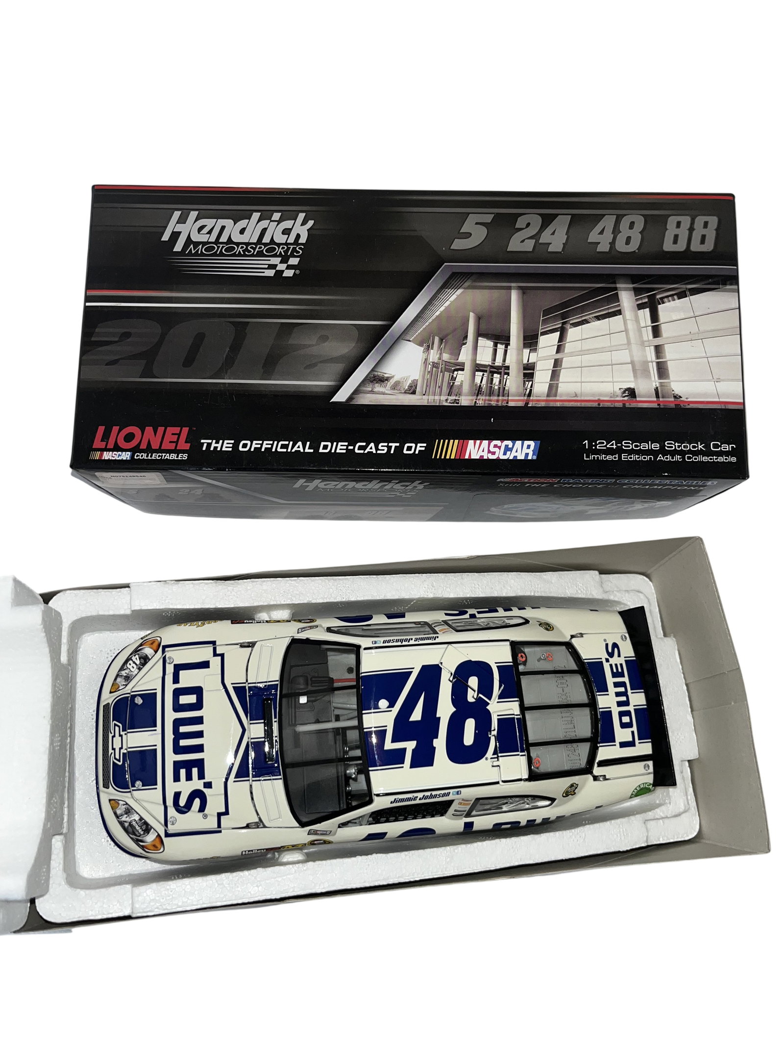LIONEL ACTION RACING COLLECTABLES JIMMIE JOHNSON #48 LOWE'S DOVER WHITE CHEVROLET IMPALA DIE-CAST: This is a professional-grade adult collectible 1:24 scale die-cast stock car manufactured by Lionel NASCAR Collectables under the Action Racing Collectables (ARC) line. The vehicle replicates the 2012