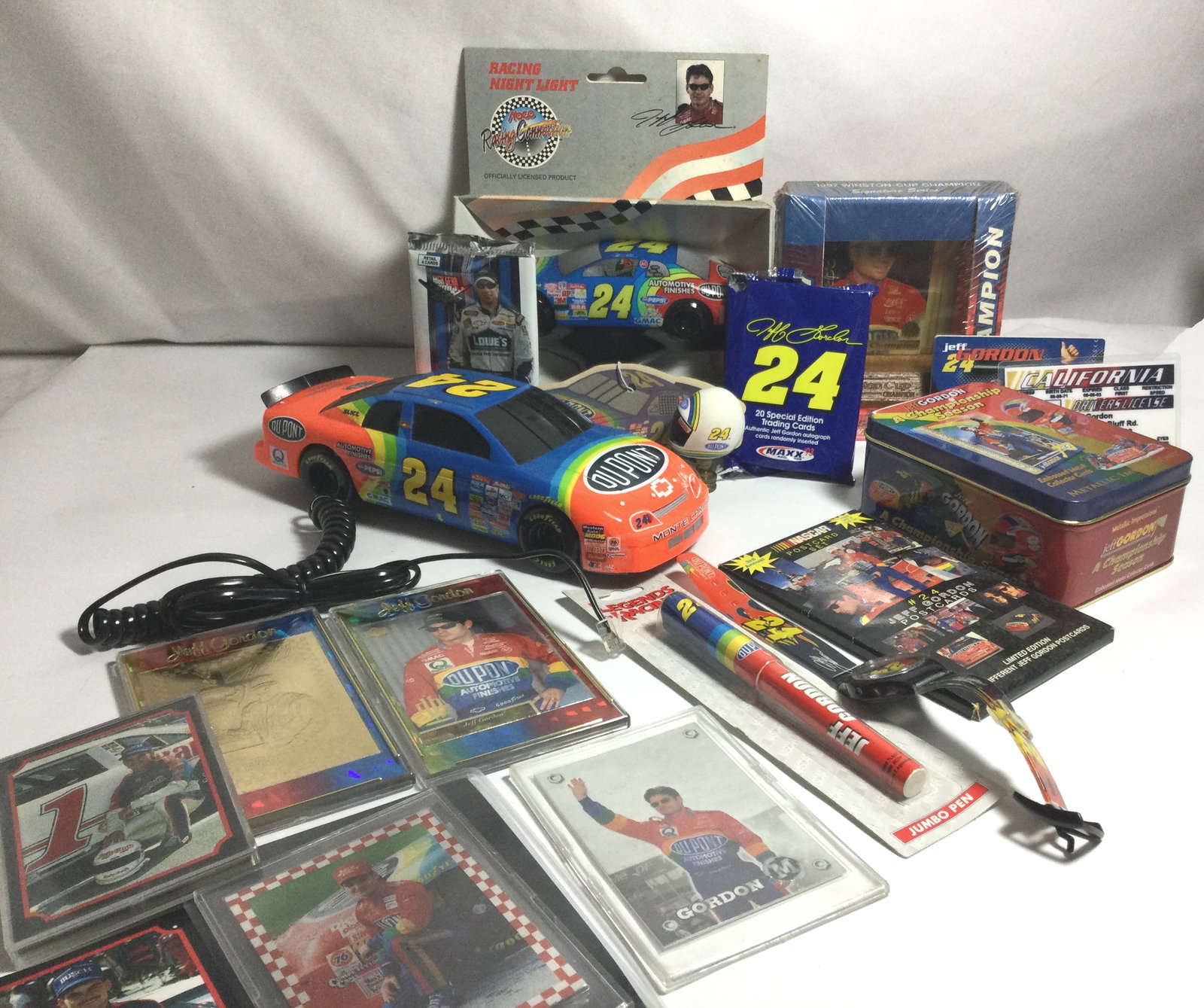 Jeff Gordon DuPont small collectibles: Collectors cards, car, watch, pen,