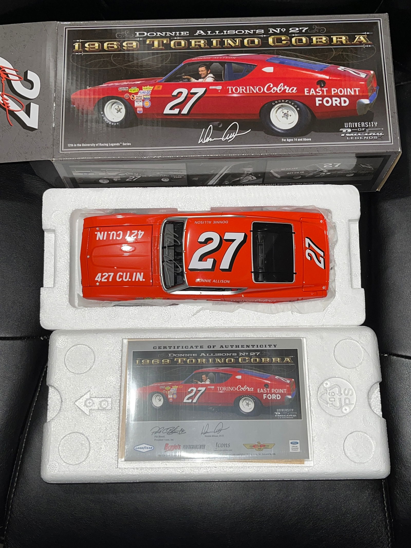 University of Racing Legends 1:24 Scale 1969 Ford Torino Cobra Model Car, 2012, Autographed with COA: Model car, University of Racing Legends (Icons, Inc.), 2012. This 1:24 scale die-cast metal and plastic replica of Donnie Allison's No. 27 1969 Ford Torino Cobra features a hand-signed windshield and