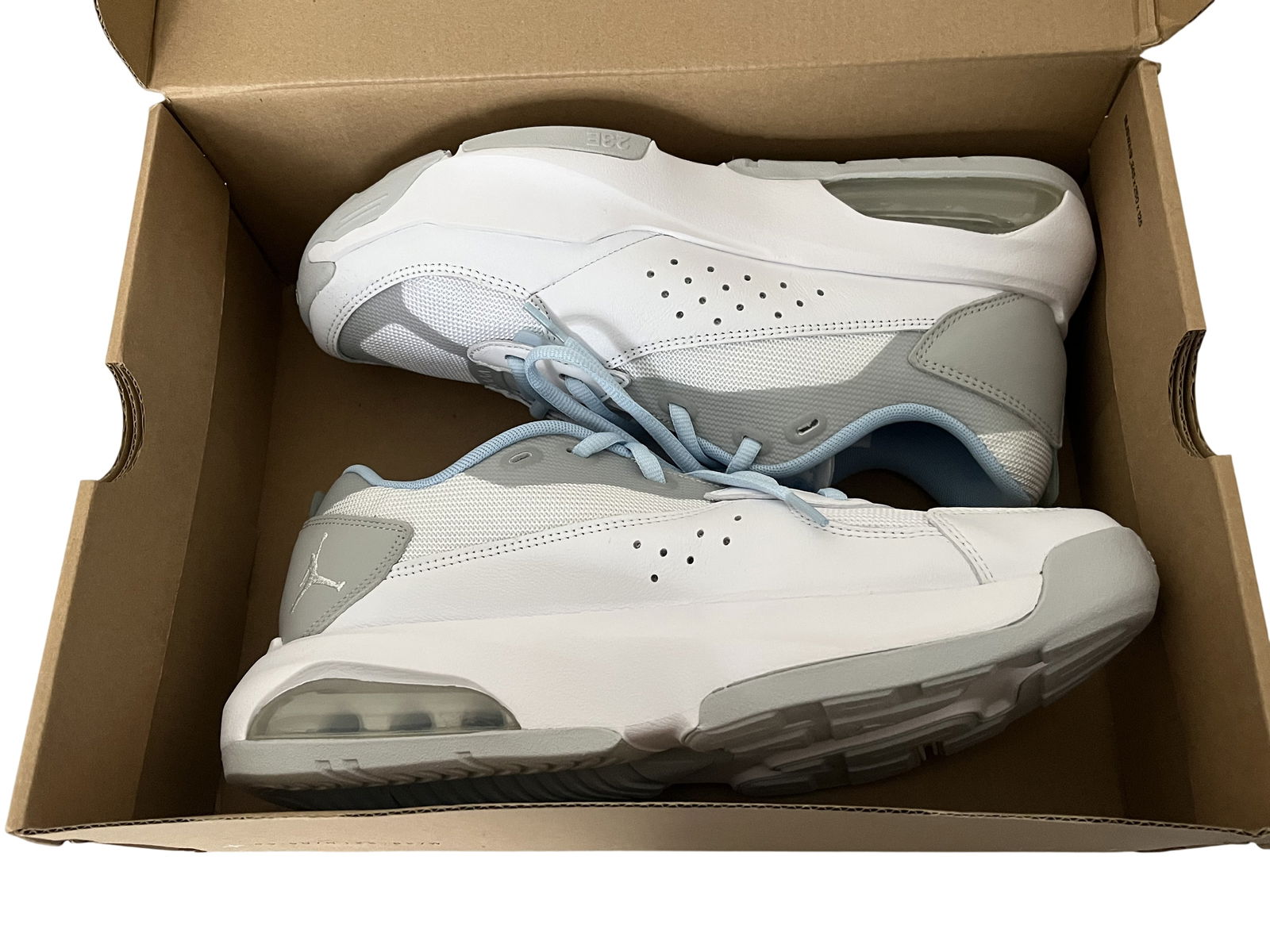 Jordan Brand Air 200E Low-Top Sneakers White and Light Blue Size 10.5: A pair of Jordan Brand low-top sneakers, specifically the Air 200E model.