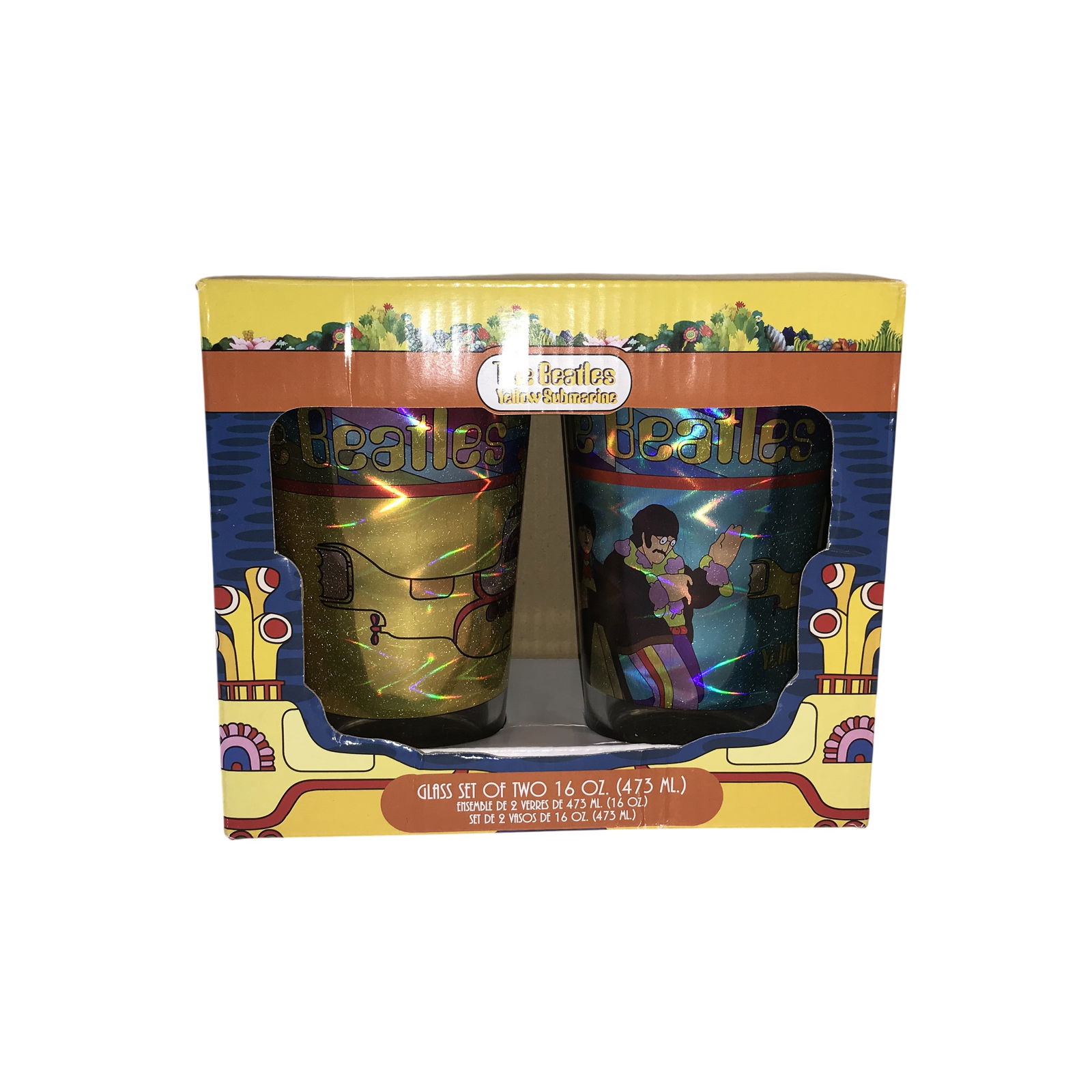 A Pair of The Beatles Yellow Submarine 16 oz Pint Glasses in Original Packaging: This lot consists of a pair of licensed pint glasses manufactured by Bioworld, featuring imagery from the 1968 animated film Yellow Submarine. Each glass has a capacity of 16 oz. (473 ml). Box