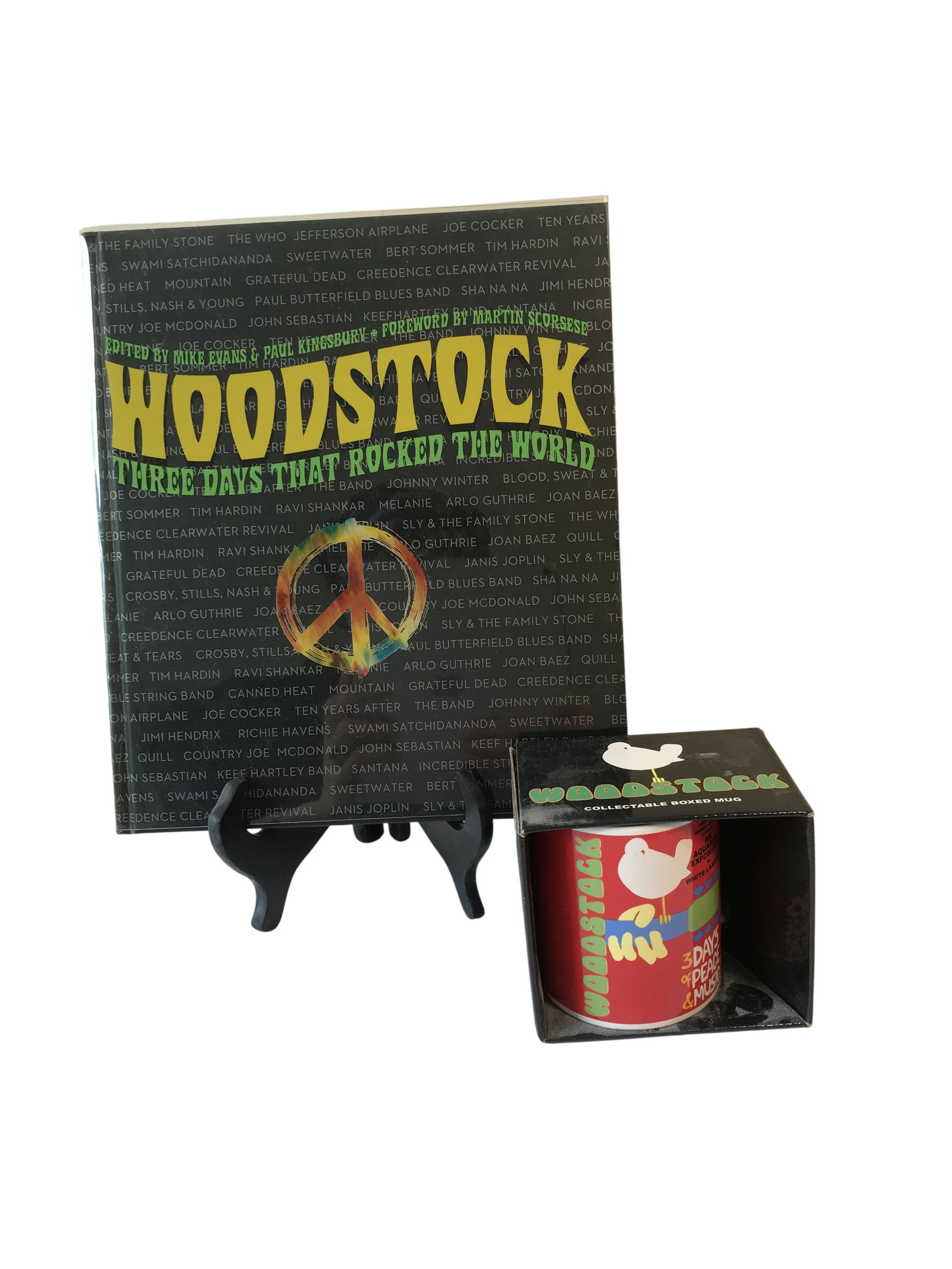 Woodstock Commemorative Items Including 40th Anniversary Book and Boxed Mug: This lot consists of two commemorative items related to the 1969 Woodstock Music & Art Fair.