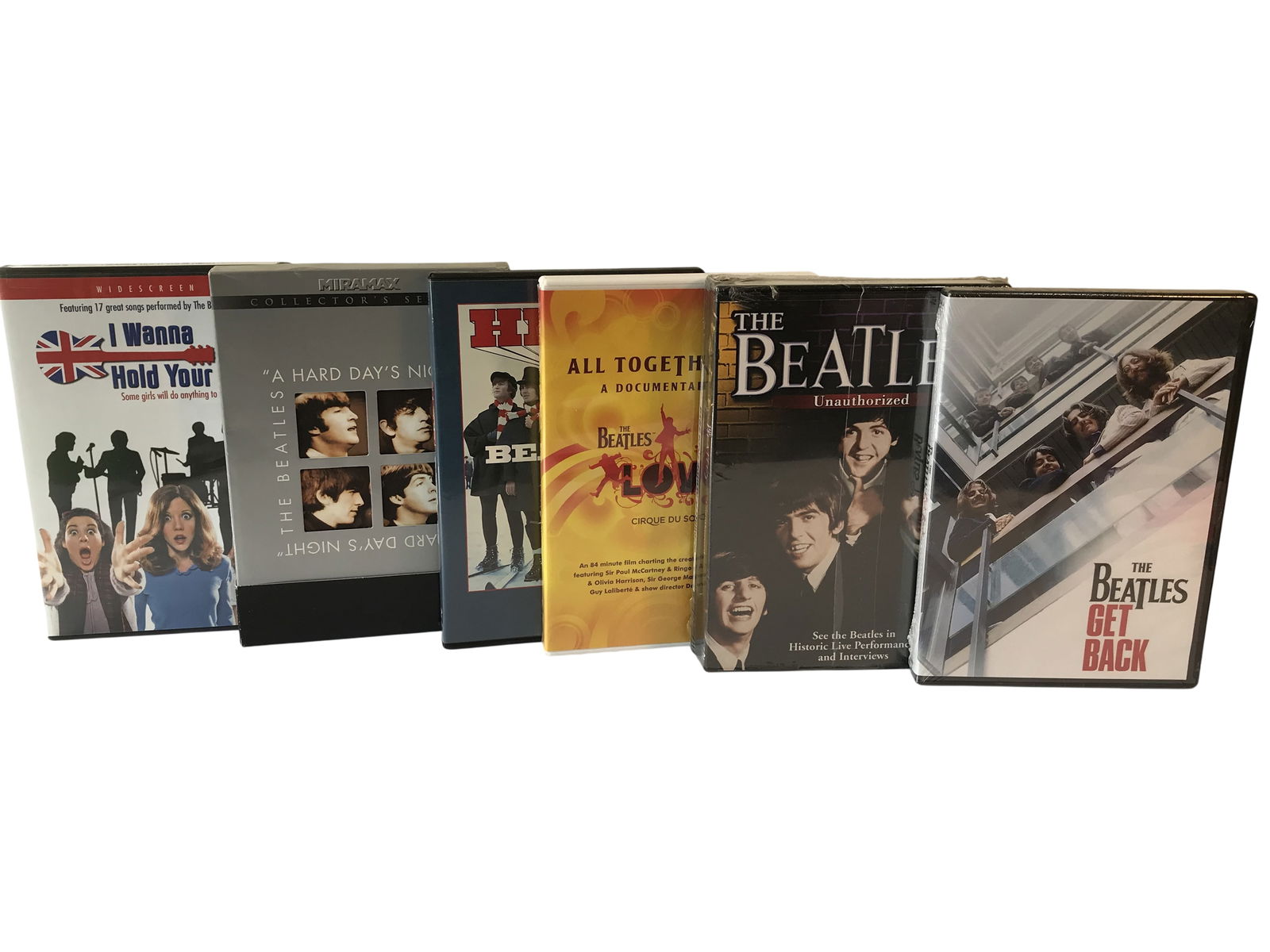 The Beatles DVD Collection (7) Including Feature Films and Documentaries: The lot includes the 1978 narrative film I Wanna Hold Your Hand (Widescreen Edition) directed by Robert Zemeckis; the Miramax Collector's Series edition of the 1964 film A Hard Day's Night, which