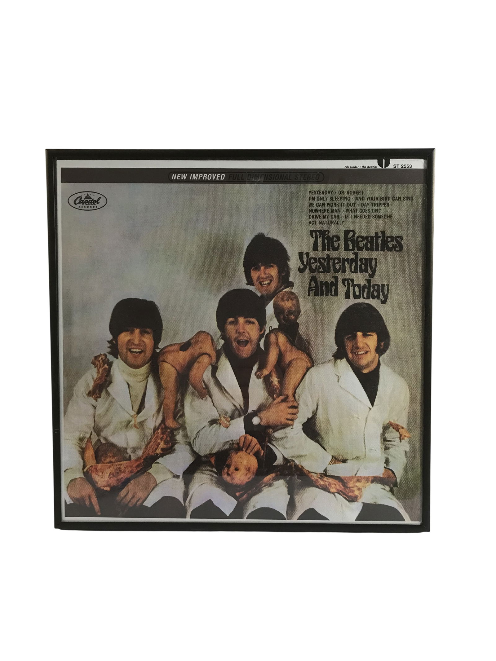 The Beatles Yesterday and Today Butcher Cover Framed Canvas Art Print by Harbortown Industries: This item is a framed canvas art print manufactured by Harbortown Industries, featuring a reproduction of the original 1966 Butcher Cover photograph for the North American Beatles album Yesterday and