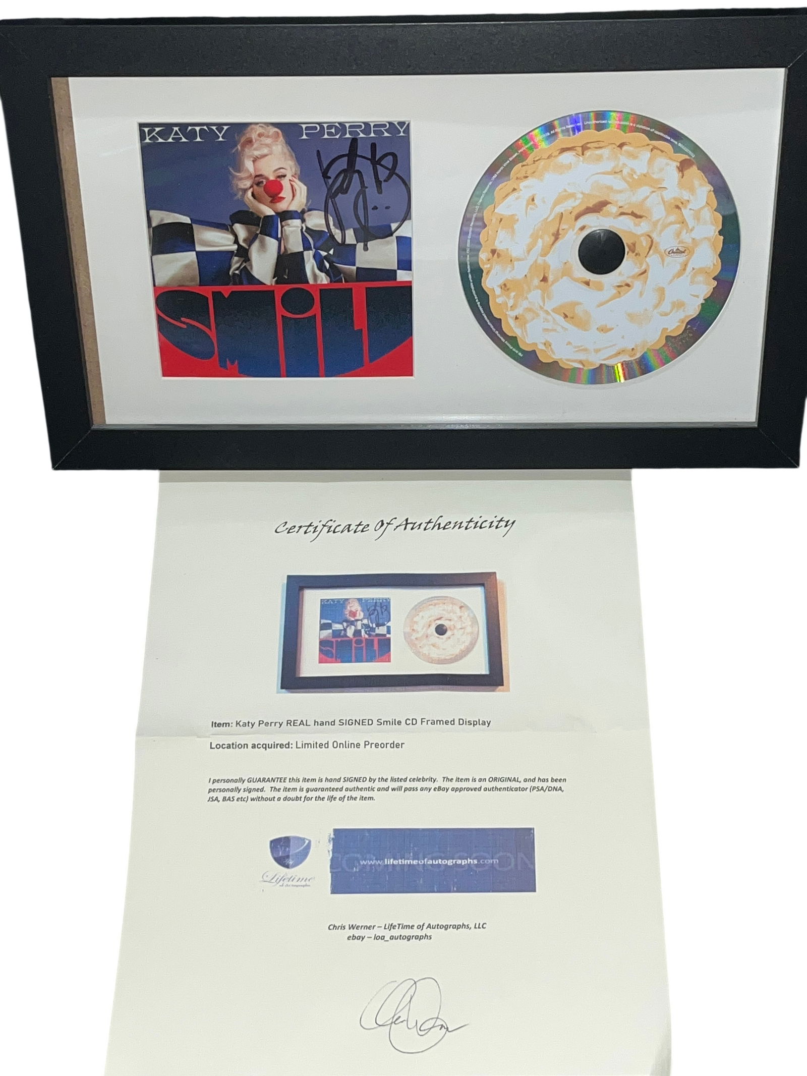 Katy Perry Signed Smile CD Album Framed Display with COA: Katy Perry hand-signed album booklet for the 2020 studio album Smile, professionally framed with the corresponding compact disc. The display features a black permanent marker autograph on the booklet