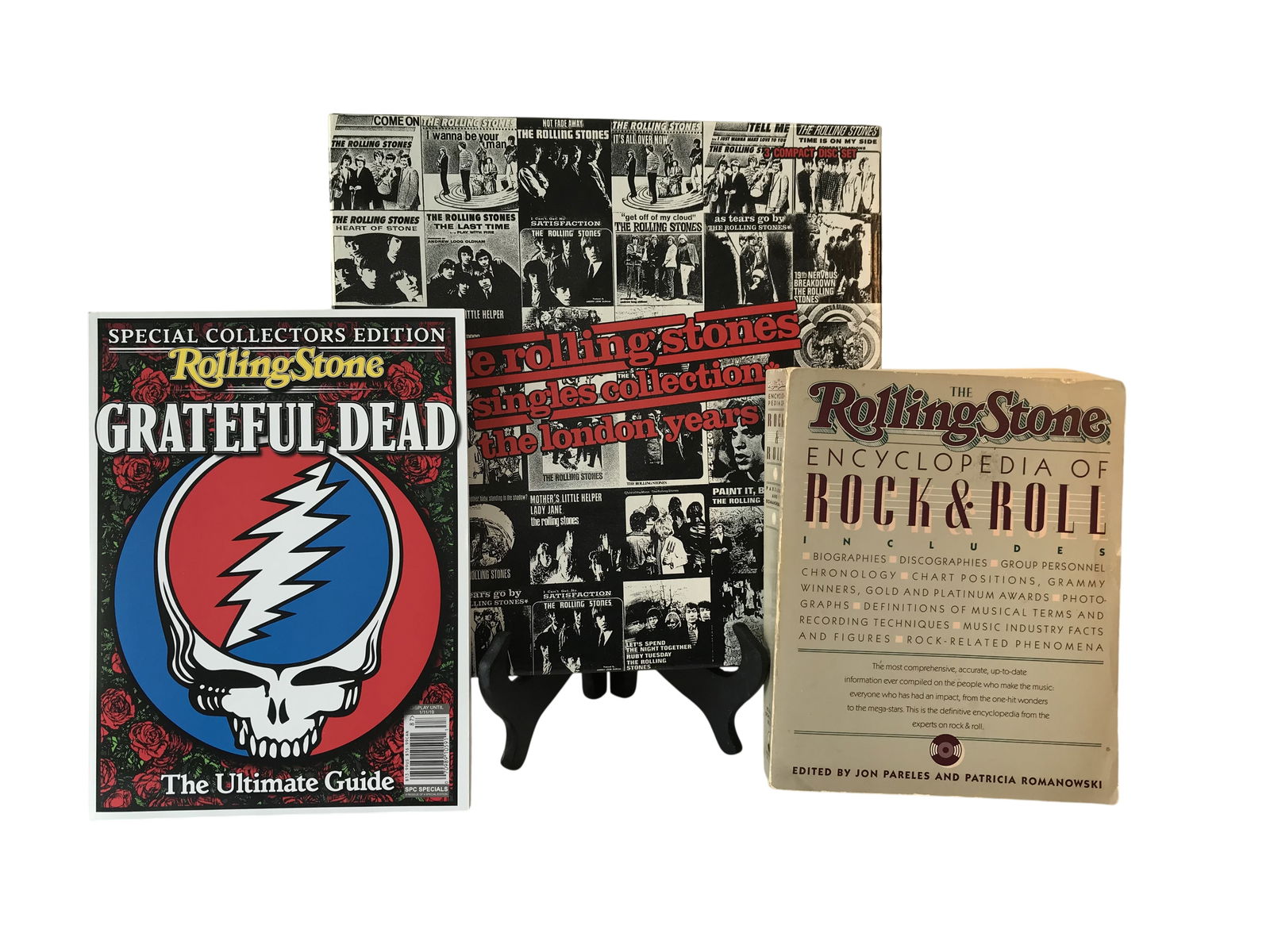 The Rolling Stones and Grateful Dead Collection: This lot consists of three items related to rock and roll history and legacy artists. The first item is a 3-compact disc box set titled The Rolling Stones Singles Collection: The London Years,
