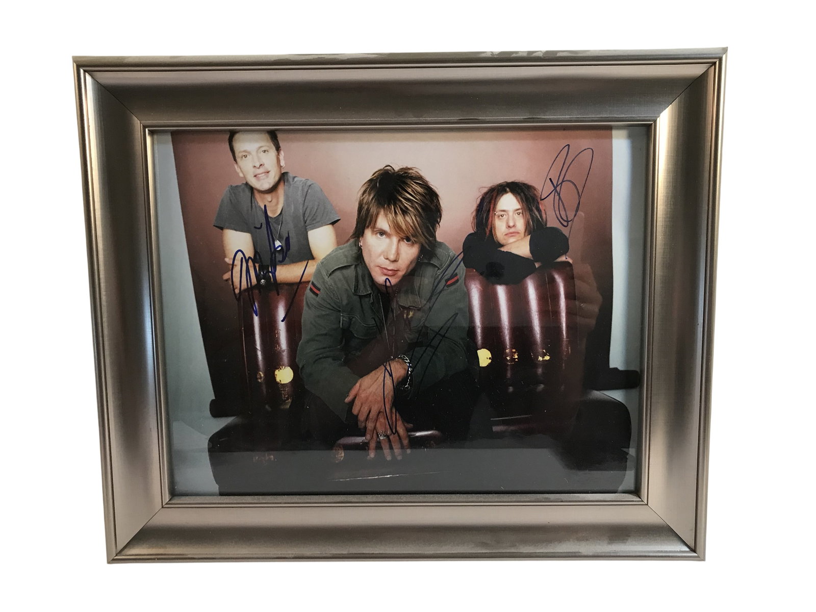 Goo Goo Dolls Band Signed Framed Photograph: Goo Goo Dolls band signed photograph featuring band members Mike Malinin, John Rzeznik, and Robby Takac, each signed in blue ink. The piece is presented in a brushed nickel Amanti Art commercial frame
