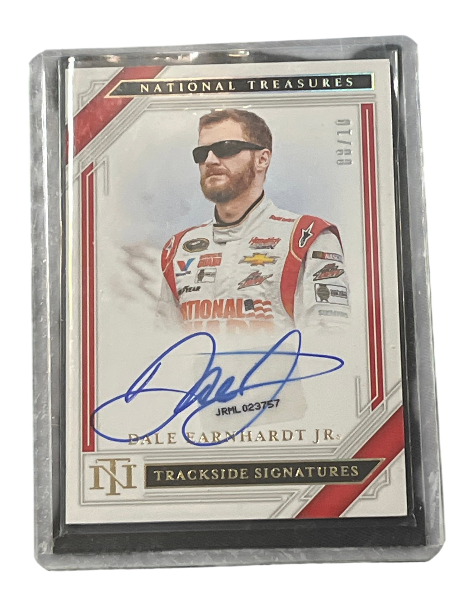 2021 Panini National Treasures Racing Dale Earnhardt Jr Trackside Signatures Autograph Card 08/10: 2021 Panini National Treasures Racing Trackside Signatures trading card featuring driver Dale Earnhardt Jr., serial numbered 08/10. The card features a blue ink on-card autograph on a white matte grou
