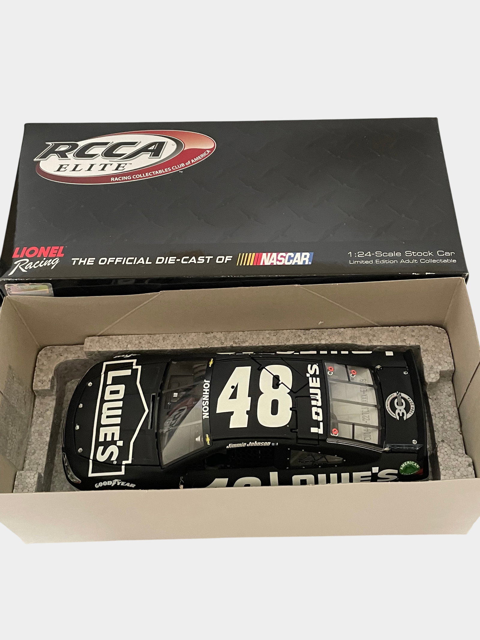 Jimmie Johnson 2014 #48 Lowe's Test Car RCCA Elite 1:24 Scale Die-Cast Stock Car: This lot features a 1:24 scale die-cast model of Jimmie Johnson's #48 Lowe's Test Car for the 2014 NASCAR season. Produced by Lionel Racing under the Racing Collectables Club of America (RCCA) Elite s