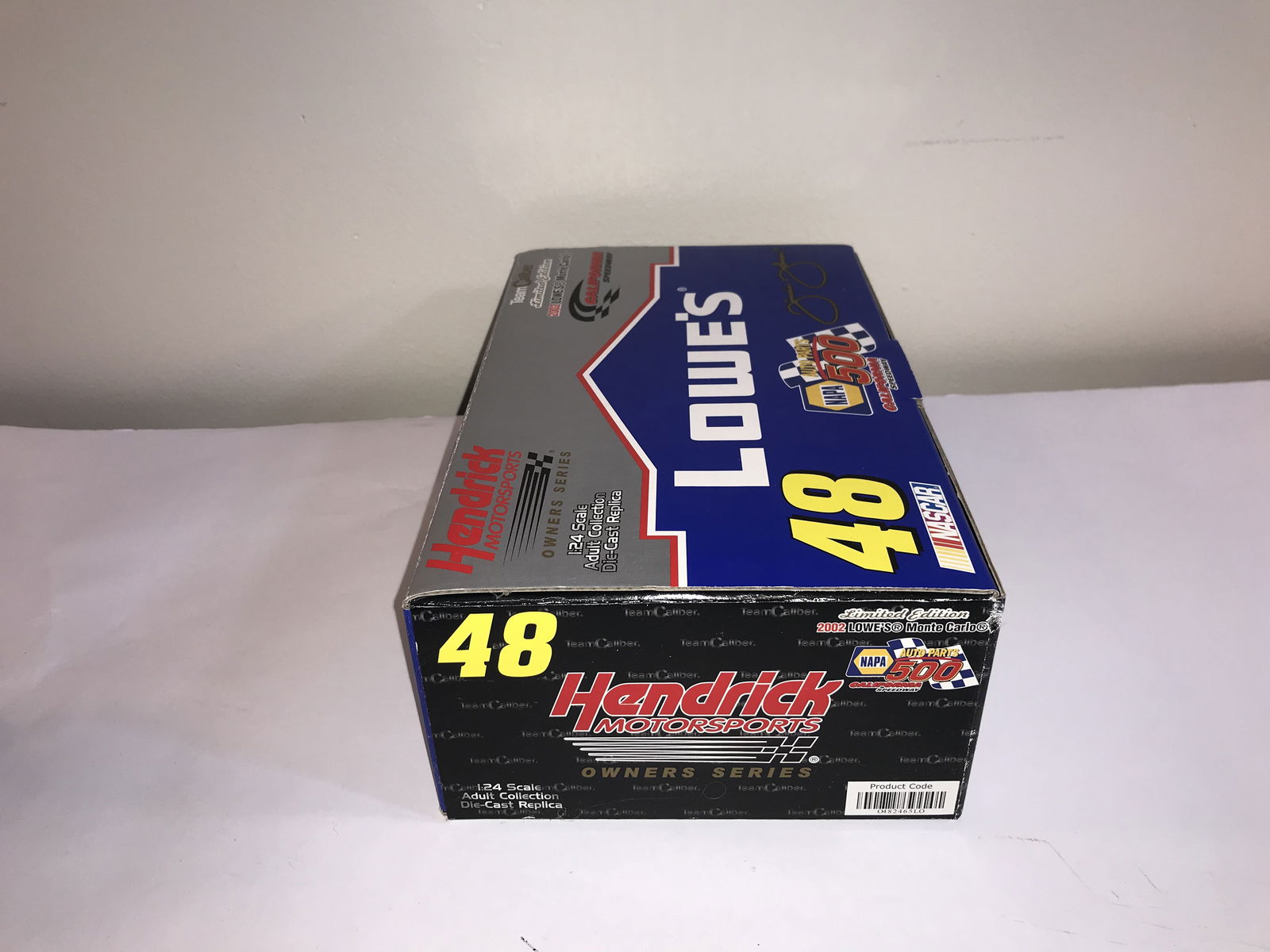 Team Caliber Owners Series Jimmie Johnson #48 Lowe's 2002 Chevrolet Monte Carlo: A Team Caliber Owners Series limited edition replica of the #48 Lowe's Chevrolet Monte Carlo driven by Jimmie Johnson for Hendrick Motorsports during the 2002 NASCAR season. This specific release feat