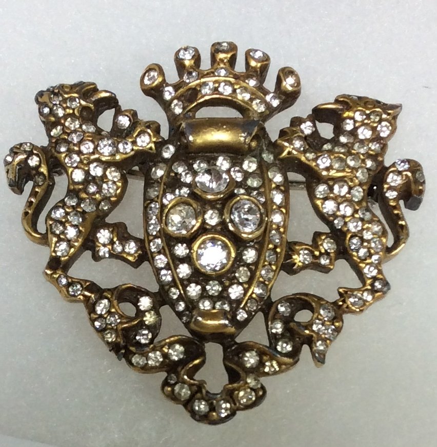 Hattie Carnegie Brooch: This piece is very elegant, yet is missing two rhinestones