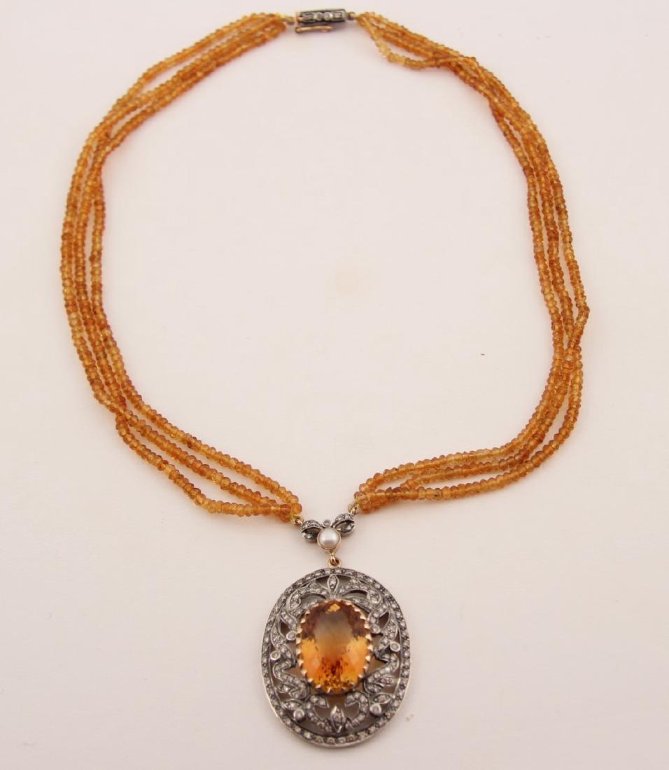 18K GOLD DIAMOND AND CITRINE NECKLACE: 18K GOLD DIAMOND AND CITRINE PENDANT NECKLACE HAVING 1.873 CTW DIAMONDS AND 20.2 CT CITRINE