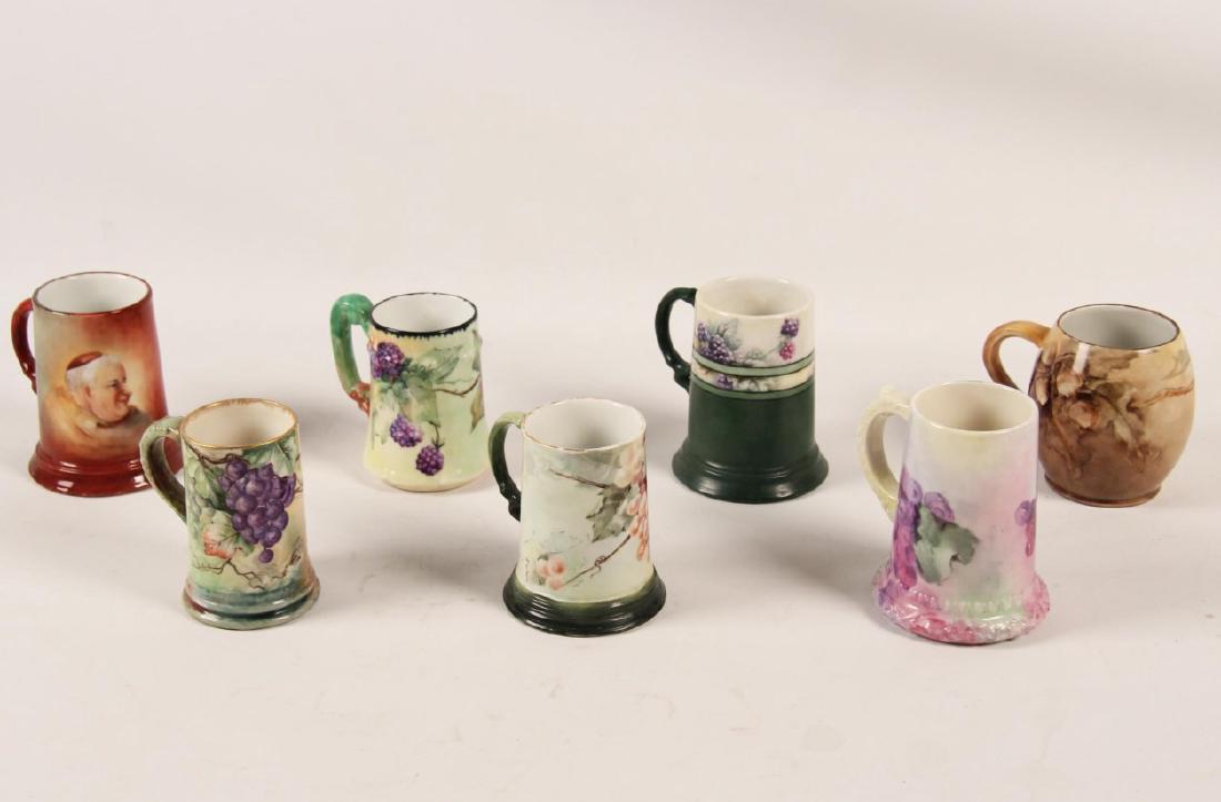 GROUP OF 7 FRENCH HAND PAINTED HANDLED MUGS: GROUP OF 7 FRENCH FLORAL HAND PAINTED HANDLED MUGS ( MOSTLY LIMOGES); 5.5"H TALLEST
