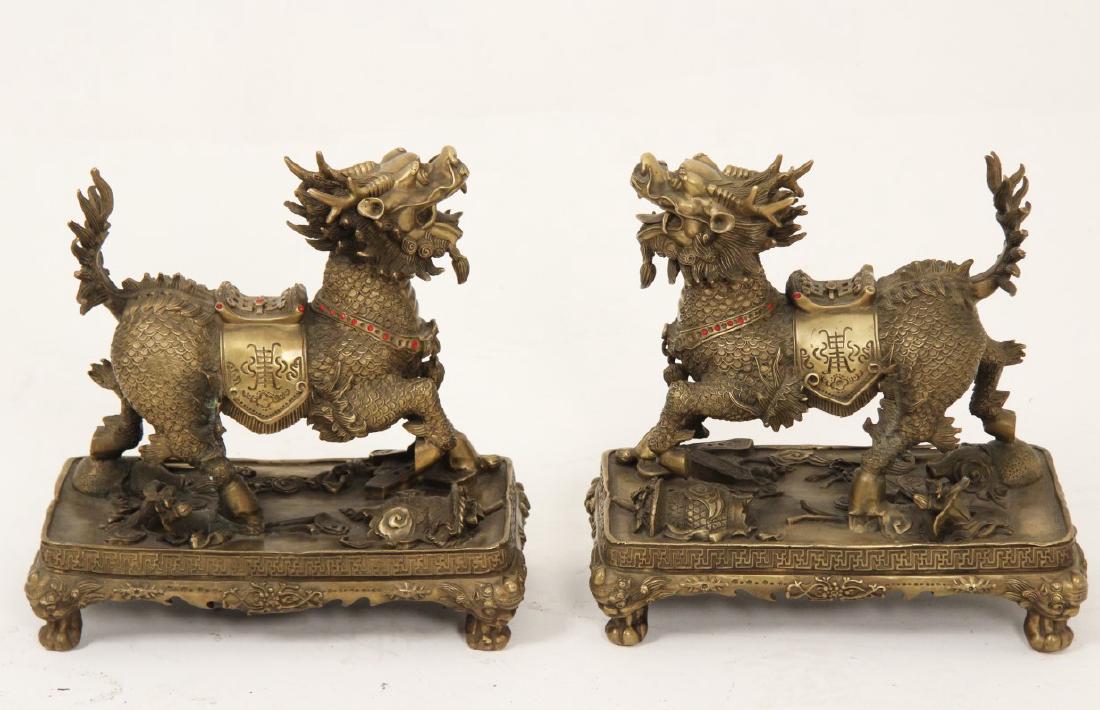 PAIR OF A HIGHLY EXPRESSIVE CHINESE BRONZE FOO DOGS (1 of 3)