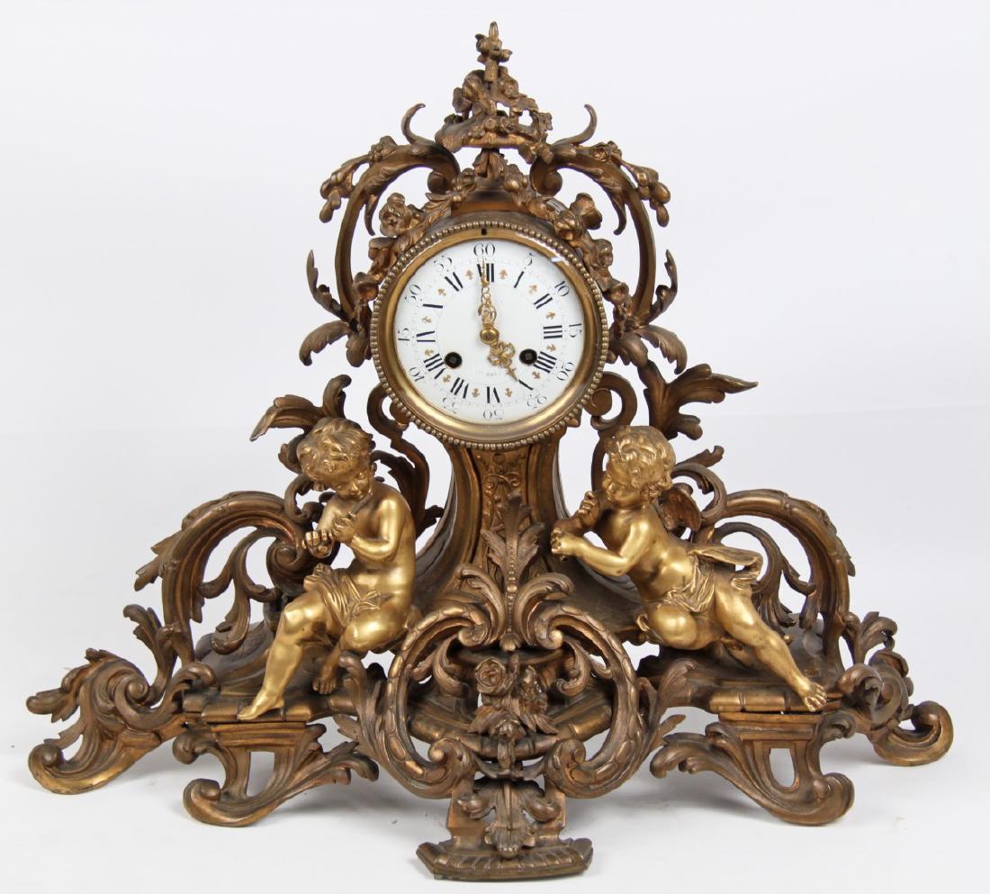 FRENCH DORE AND BRONZE CLOCK WITH PUTTI AND CHERUB (1 of 3)