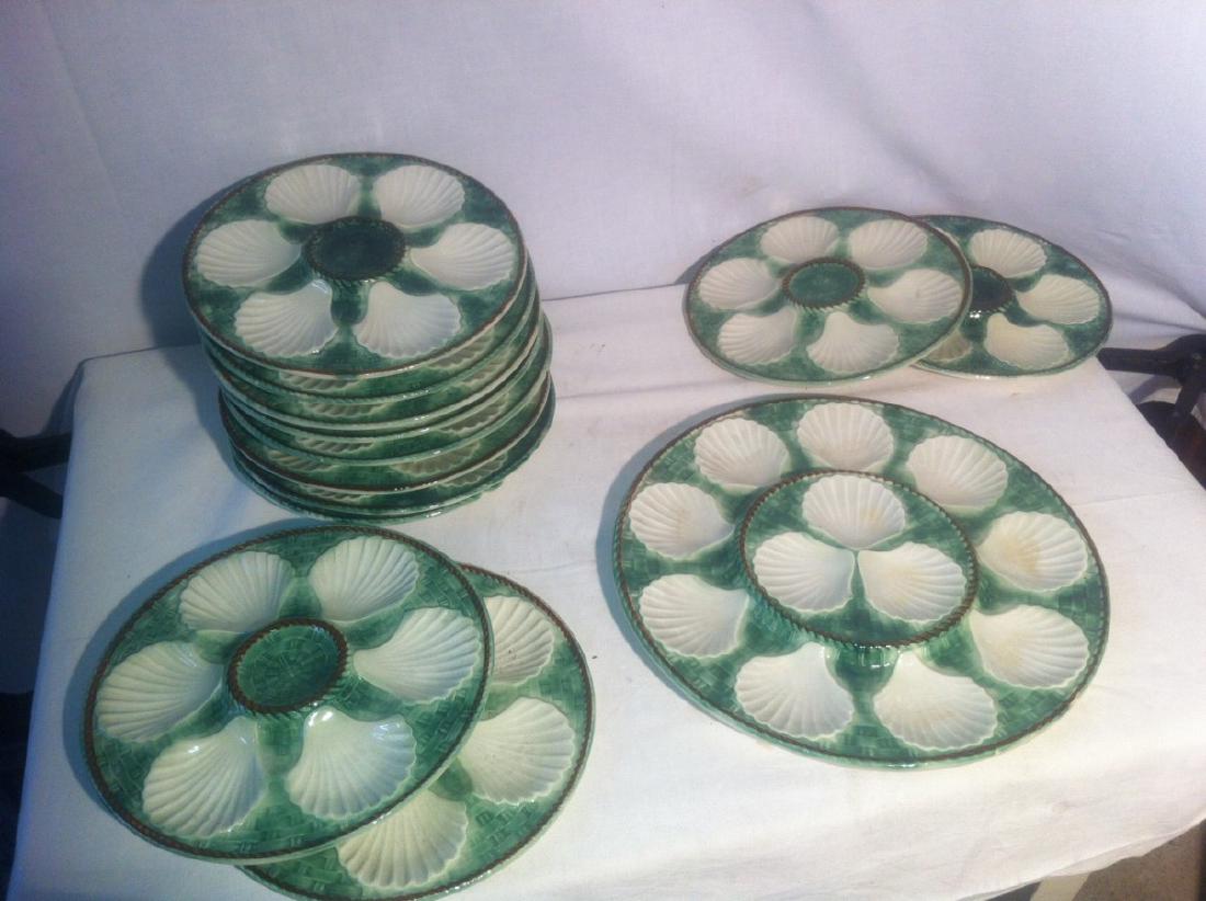 12 OYSTER PLATES AND 1 MASTER DISH, LONGCHAMP FRANCE: 12 OYSTER PLATES AND 1 MASTER DISH MARKED ON REVERSE LONGCHAMP FRANCE; 13"DIA. PLATTER, 9.5"DIA. PLATES