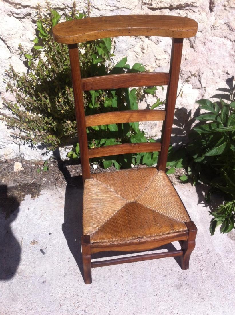 PROVINCIAL WALNUT PRIE DIEU: PROVINCIAL WALNUT PRIE DIEU WITH LADDER BACK AND RUSH SEAT; 34"H X 17"W X 14"D