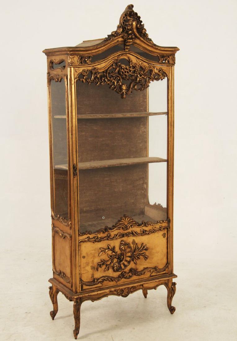LOUIS XV STYLE FLORENTINE CARVED GILT WOOD VITRINE: LOUIS XV STYLE FLORENTINE CARVED GILT WOOD VITRINE ON CABRIOLE LEG AND SCROLL FEET; 74.5"H X 29"W X 14"D