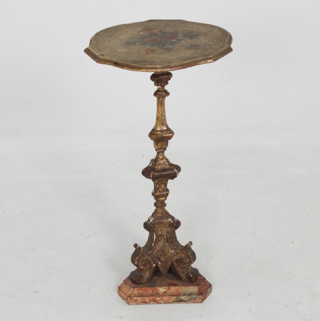 CARVED ITALIAN PRICKET CANDLESTAND: CARVED ITALIAN POLYCHROME PRICKET CANDLESTAND ON FAUX TRIFID MARBLE STAND; 31"H X 16"W