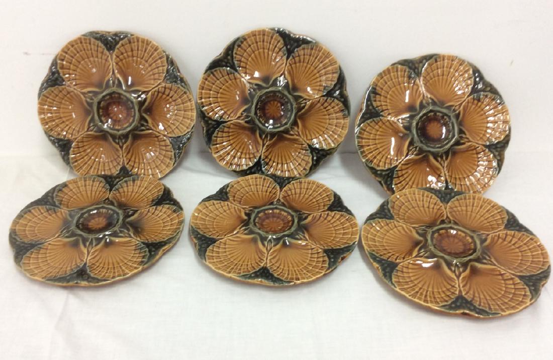 SET OF 6 FRENCH MAJOLICA OYSTER PLATES: SET OF 6 FRENCH SCALLOPED EDGE MAJOLICA OYSTER PLATES WITH DARK GREEN AND EARTHENWARE TONES