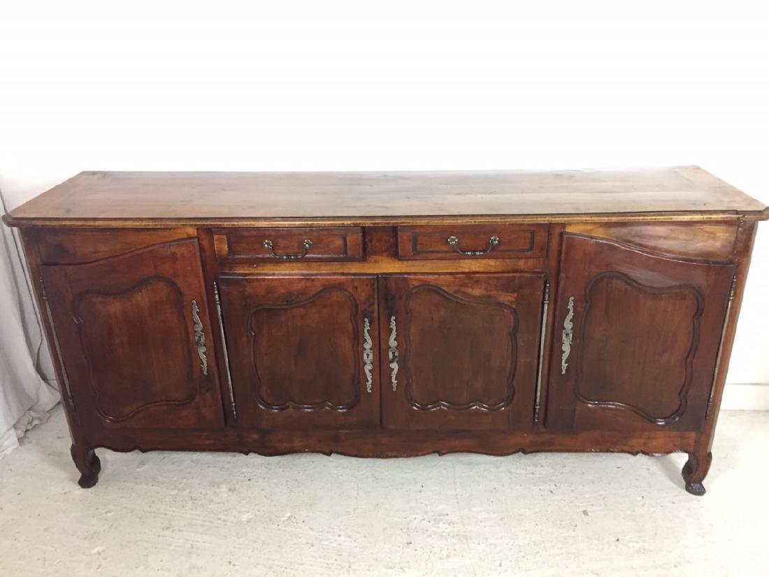 19TH C. LOUIS XV STLYE FRUITWOOD BUFFET: LOUIS XV STYLE FRUITWOOD BUFFET HAVING MOLDED EDGE TOP OVER TWO DRAWERS AND 2 PAIR OF CUPBOARD DOORS WITH SCALLOP APRON ON CABRIOLE LEGS, 19TH C.; 39"H X 87"W X 22"D