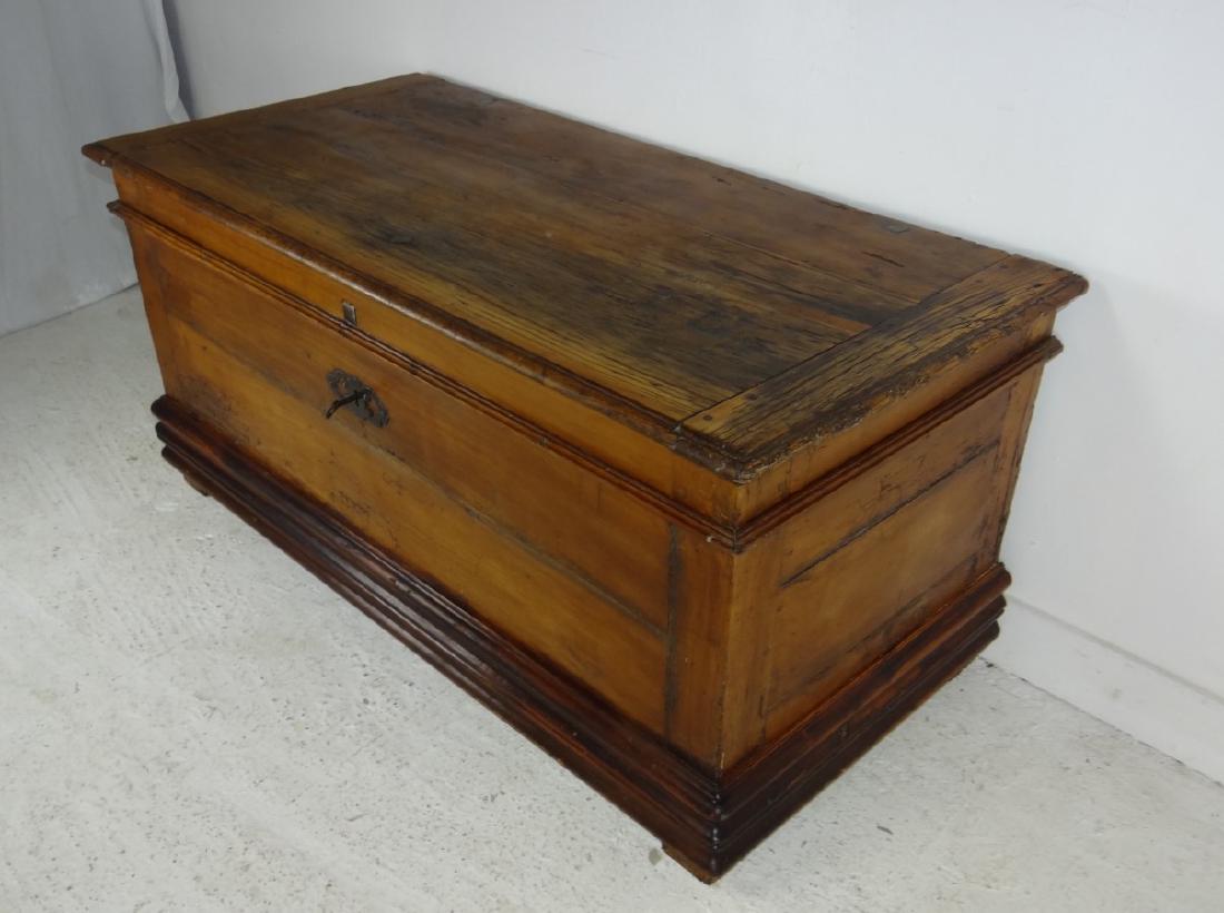 PROVINCIAL MIXED WOOD LIFT TOP TRADESMAN'S CHEST: PROVINCIAL MIXED WOOD LIFT TOP TRADESMAN'S CHEST WITH PEG CONSTRUCTION AND WROUGHT STRAP HINGES, 19TH C.; 23.5" X 51" X 24.5"