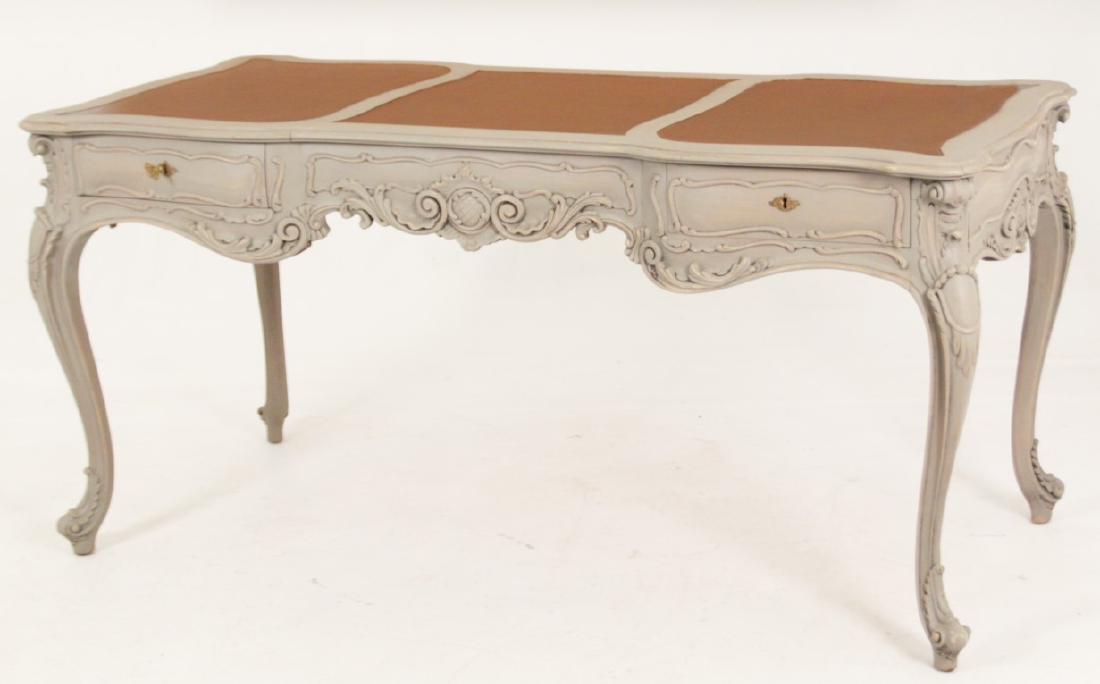 LOUIS XV STYLE CARVED AND PAINTED BUREAU PLAT: DECORATIVE LOUIS XV STYLE CARVED AND PAINTED 3 DRAWER BUREAU PLAT WITH BROWN TOOLED LEATHER TOP; 31"H X 66"W X 31"D
