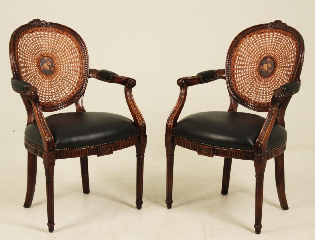 PR. OF LOUIS XVI STYLE CANE AND HANDPAINTED CHAIRS: PAIR OF LOUIS XVI STYLE MAHOGANY AND LEATHER SEAT CHAIRS HAVING CANE AND FLORAL HAND PAINTED MEDALLION BACK; 38"H X 24"W X 19"D