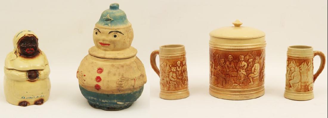5 PC. LOT OF EARLY AMERICAN POTTERY: 5 PIECE LOT OF EARLY AMERICAN POTTERY CONSISTING OF 2 STEINS AND LIDDED JAR BY HULL, ALONG WITH 2 EARLY COOKIE JARS; 14"H TALLEST POLICE COOKIE JAR; CONDITION: HAIRLINE CRACK ON LID OF HULL LIDDED JAR