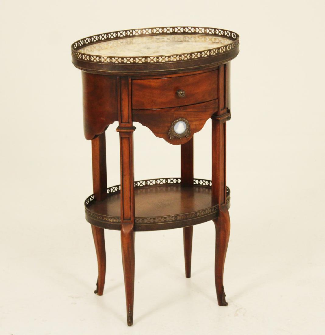 LOUIS XV STYLE 2 TIER MAHOGANY OVAL M/TOP STAND: LOUIS XV STYLE TWO TIER MAHOGANY OVAL MARBLE TOP ONE DRAWER STAND WITH BRONZE GALLERY AND JASPERWARE MOUNTED APRON; 28"H X 17"W X 12"D