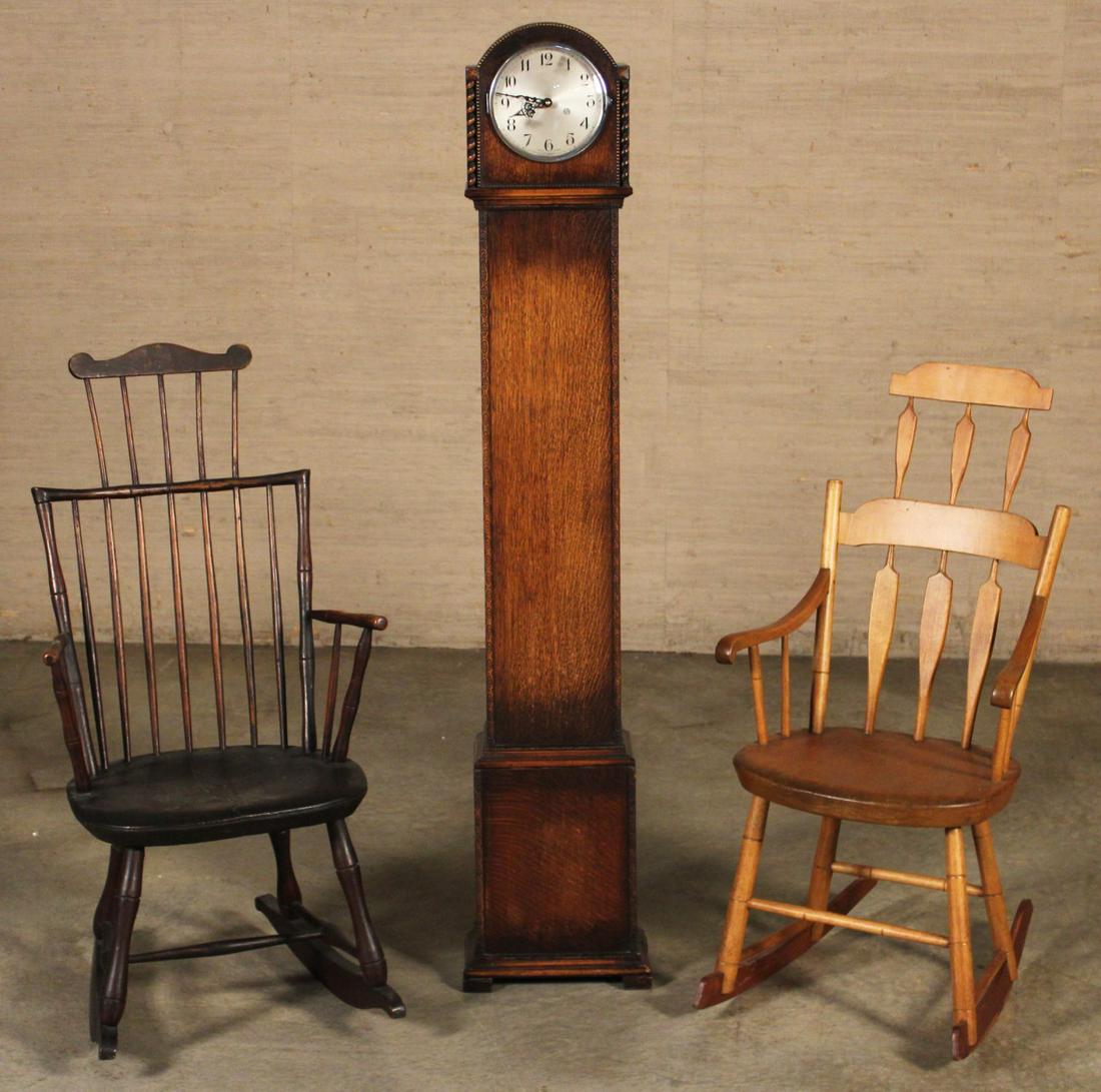 3 PC. LOT OF FURNITURE: 3 PIECE LOT INCLUDING ARROW BACK AND SPINDLE BACK ROCKING WINDSORS, ALONG WITH AN OAK GRANDMOTHER CLOCK; CLOCK 60"H CHAIRS APPROX. 40"H