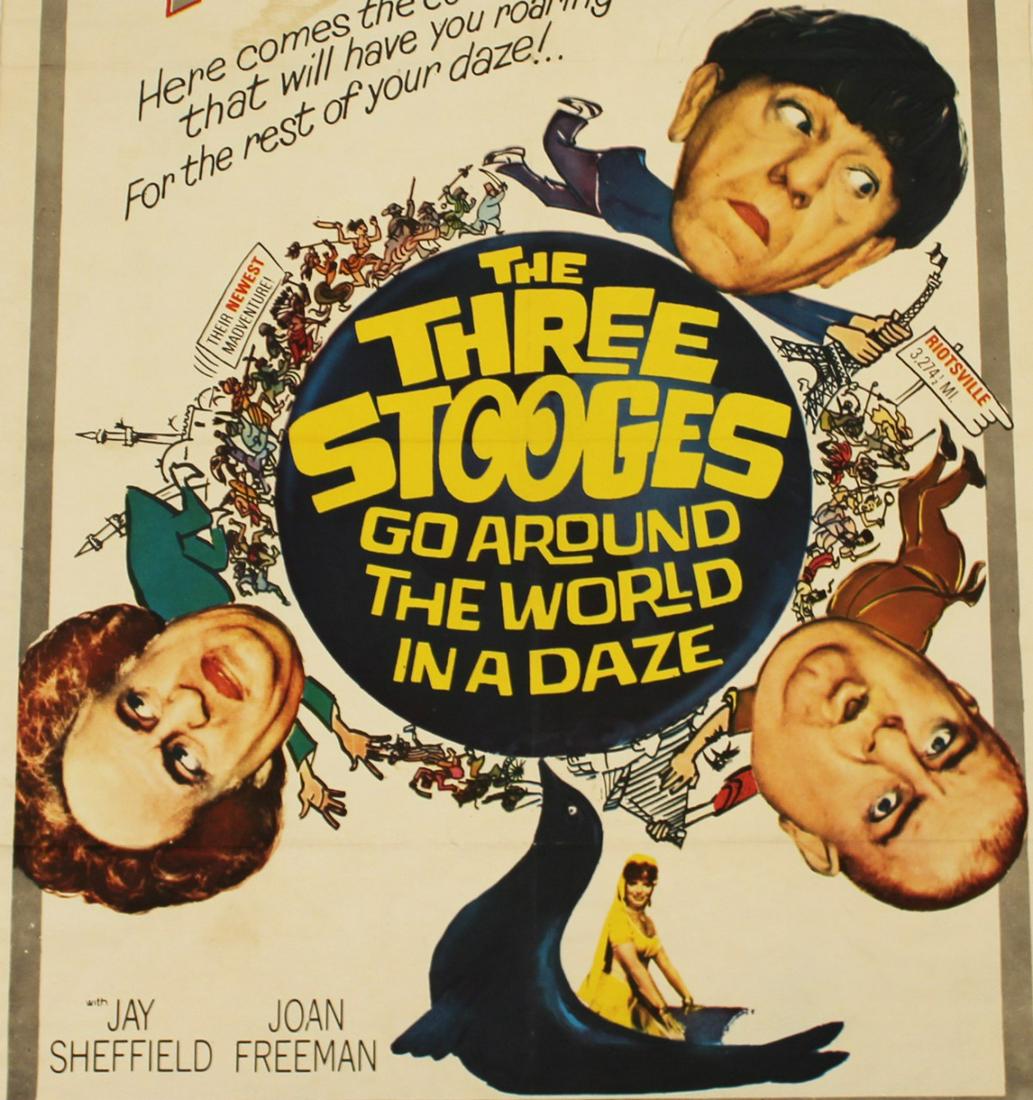 THE THREE STOOGES: THREE STOOGES ONE SHEET MOVIE POSTER "THE THREE STOOGES GO AROUND THE WORLD IN A DAZE" (COLUMBIA PICTURES, 1963); 41"H X 27"W; CONDITION: FOLD WEAR AS ISSUED, TONING TO PAPER, PIN HOLES AT CORNERS AND
