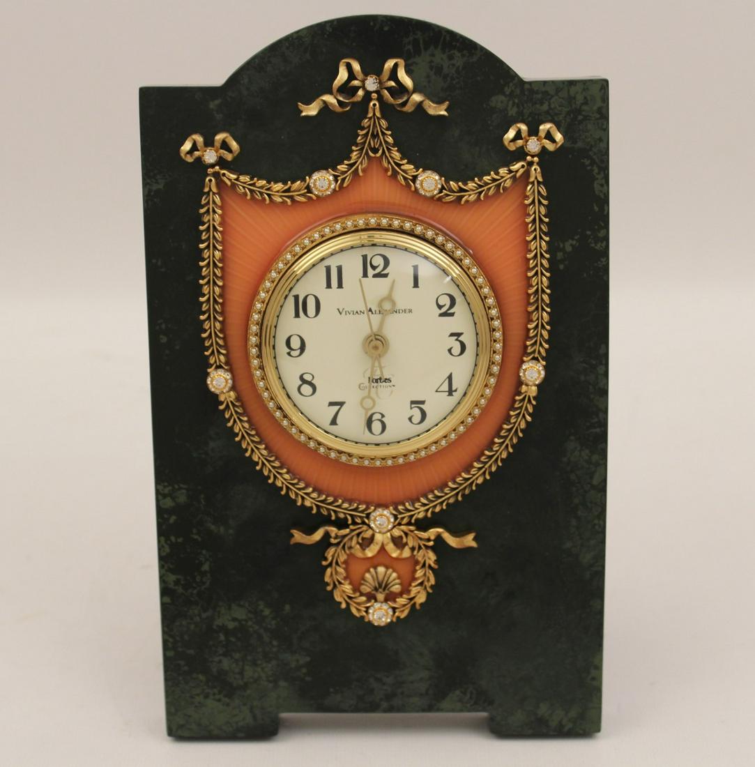 25TH ANNIVERSAY CLOCK; FORBES COLLECTION: TWENTY FIFTH ANNIVERSARY CLOCK INSPIRED BY PETER CARL FABERGE (RUSSIAN 1846-1920), AFTER THE ORIGINAL MODEL BY HENRIK WIGSTROM, RENDERED IN A LUSTROUS PINK ENAMEL OVER A GUILLOCHE GROUND AND RECREATED