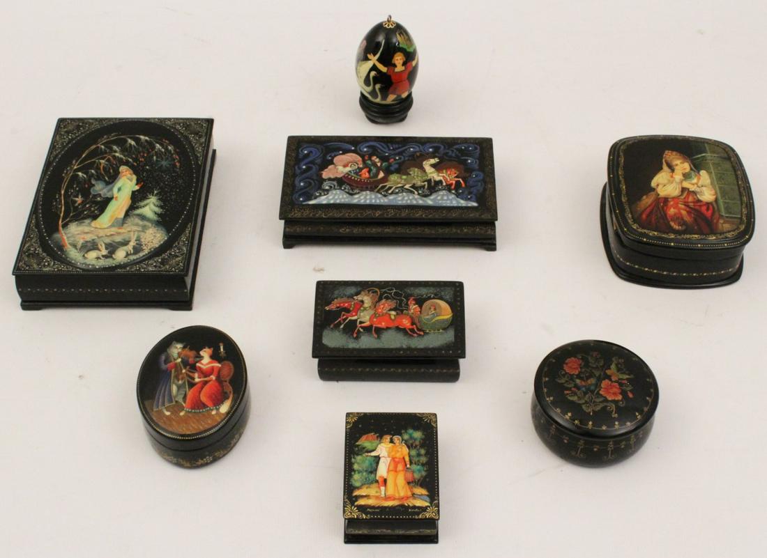 MISCELLANEOUS GROUP OF 8 RUSSIAN BLACK LACQUERED BOXES: MISCELLANEOUS GROUP OF 8 RUSSIAN BLACK LACQUERED BOXES, 5 DEPICTING VARIOUS MYTHOLOGICAL SCENES; LARGER BOXES APPEAR TO BE SIGNED; LARGEST 1.25"H X 6"W X 4.25"D W/SCENE OF LADY WITH RABBITS; PROPERTY 