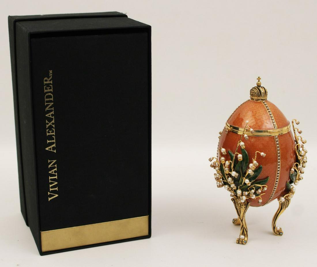 "LILIES OF THE VALLEY" EGG; FORBES COLLECTION: "LILIES OF THE VALLEY" RECREATED FABERGE EGG FOR THE FORBES COLLECTION BY VIVIAN ALEXANDER; THE EGG WITH SALMON COLORED ENAMEL ON QUILLOCHE GROUND BODY ADORNED WITH CHINESE PEARLS, AUSTRIAN CRYSTALS O