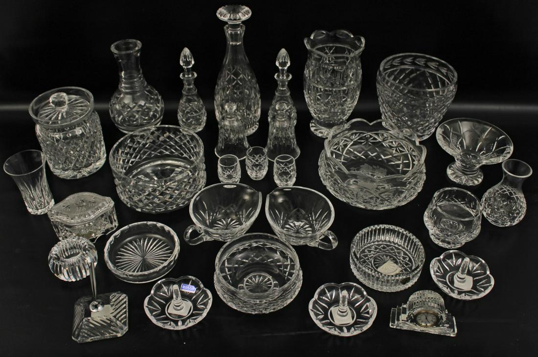 TREMENDOUS 30 PIECE LOT OF SIGNED WATERFORD CRYSTAL: TREMENDOUS 30 PIECE LOT OF SIGNED WATERFORD CRYSTAL INCLUDING A CARAFE, WINE DECANTER, BOWLS, CANDY JAR, PAIR OF DECANTERS, PEN STAND, CLOCK, AND OTHER ITEMS OF INTEREST; 11.5"H TALLEST; PROPERTY OF T