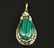 14K Y/G AND MALACHITE PENDANT; 8.6 GR TW