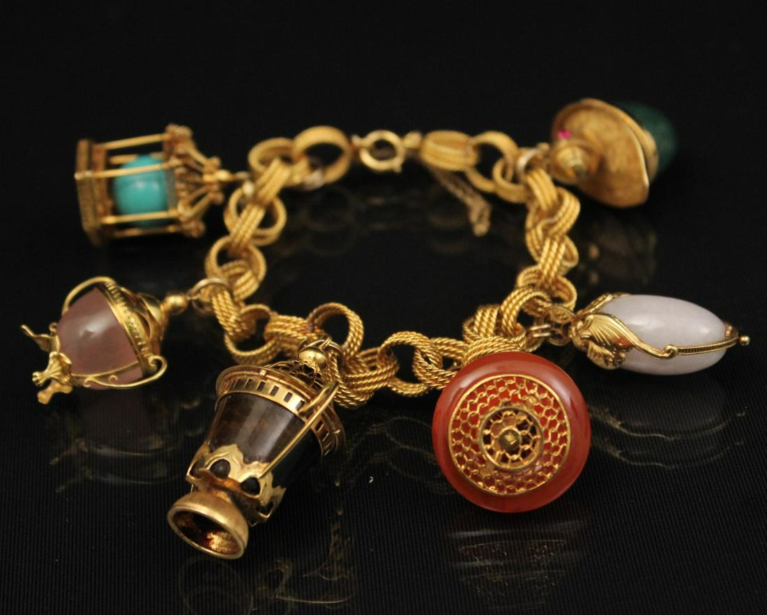 UNUSUAL 14K Y/G CHARM BRACELET W/ 6 CHARMS;  61.8 GR TW (1 of 3)