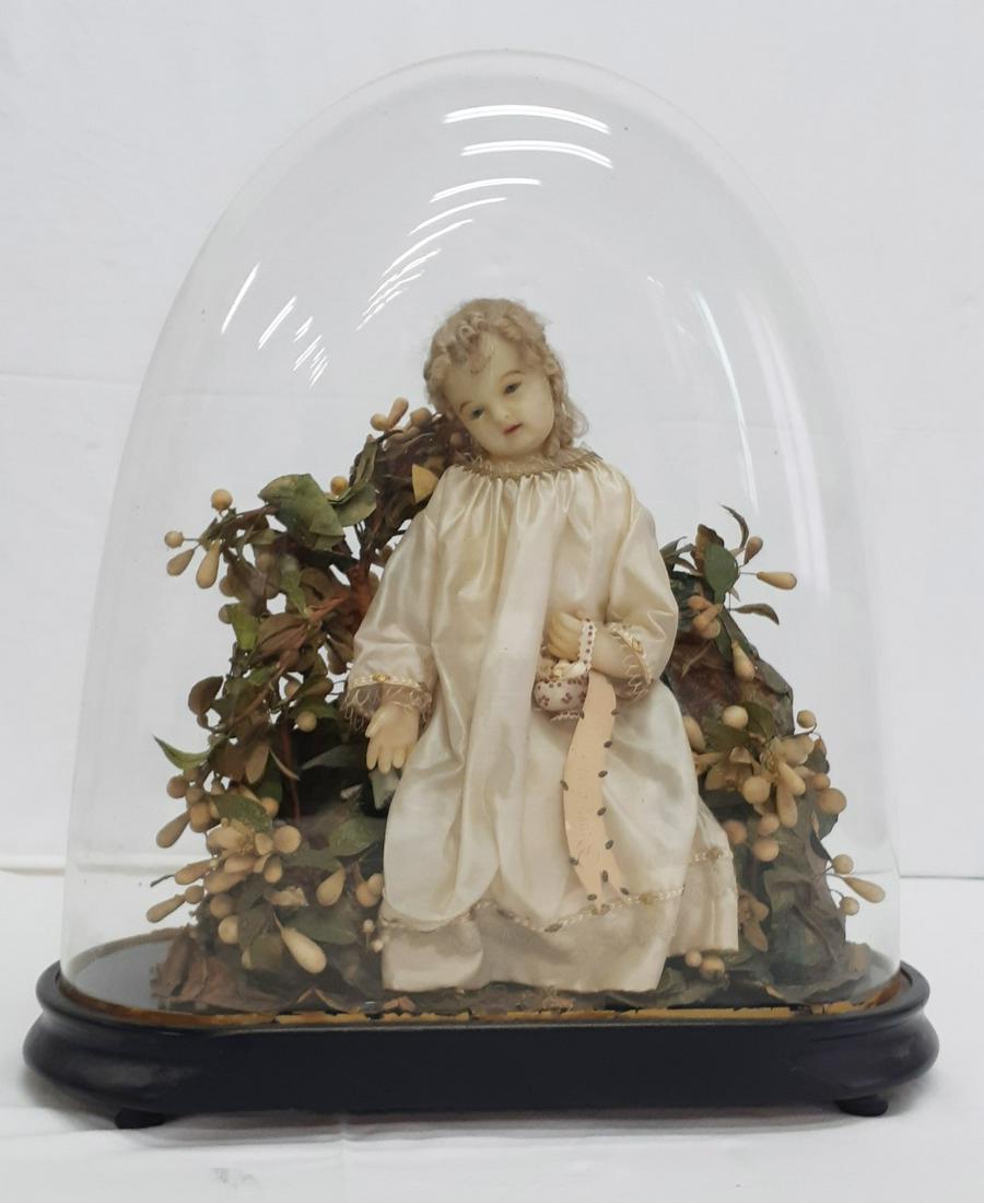 WAX DOLL OF SMALL CHILD IN GLASS DOME ON STAND (1 of 2)
