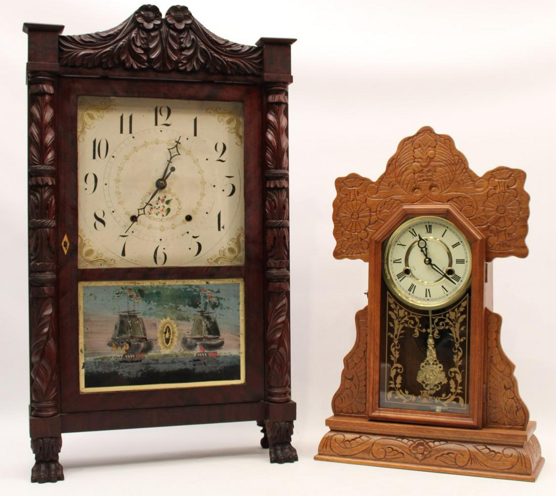 SETH THOMAS SHELF CLOCK; AND AMER. KITCHEN CLOCK: AMERICAN EMPIRE CARVED MAHOGANY SETH THOMAS SHELF CLOCK WITH EGLOMIZED PANEL WITH WEIGHTS (MISSING ONE RETURN ON PEDIMENT, AND CARVING LOSS); ALONG WITH AN AMERICAN OAK KITCHEN CLOCK; 2 PCS.TOTAL; 28"