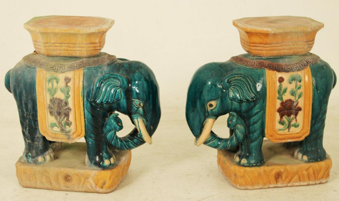 PR. OF ELEPHANT FORMED GLAZED TERRA COTTA PEDESTALS: PAIR OF ELEPHANT FORMED GLAZED TERRA COTTA PEDESTALS; 21"H X 18"W X 9.5"D