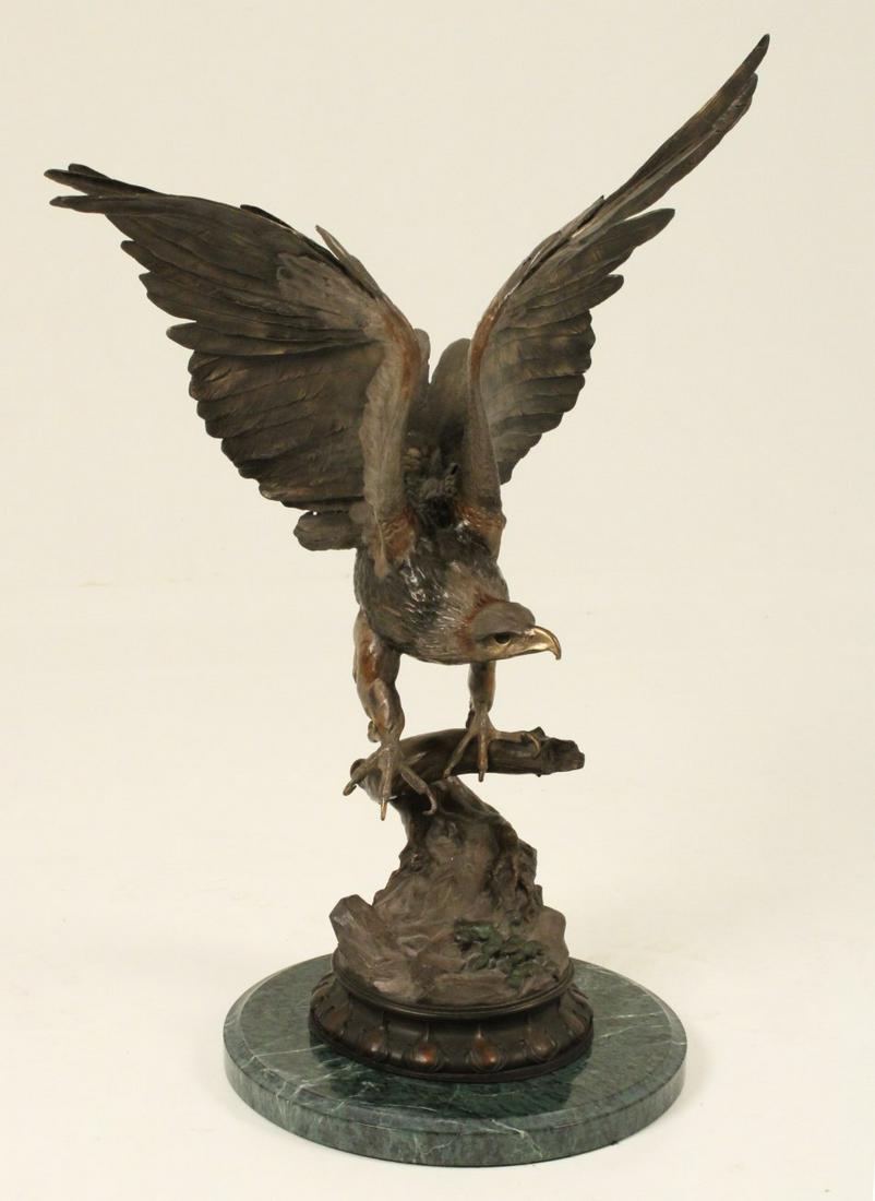 AFTER JULES MOIGNIEZ (FRENCH 1835-1894) LARGE BRONZE: AFTER JULES MOIGNIEZ (FRENCH 1835-1894) LARGE BRONZE SCULPTURE OF AN EAGLE WITH WINGS SPREAD AND CLAWS SPRAWLING FOR ITS PREY, A LARGER CASTING OF MOIGNIEZ MOST SOUGHT AFTER MODEL, WITH POLYCHROME ACC
