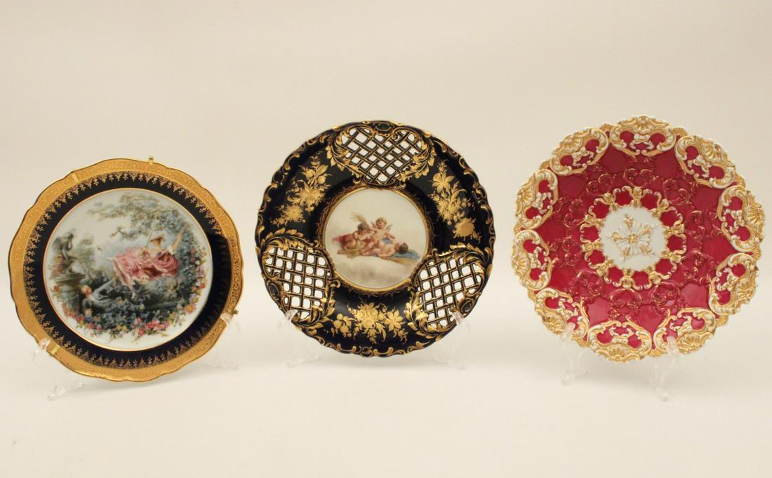 MISC. LOT OF 3 CONTINENTAL PORCELAIN PLATES: MISC. LOT OF 3 CONTINENTAL PORCELAIN PLATES INCLUDING COBALT GROUND RETICULATED AND GOLD EMBOSSED ROYAL VIENNA PLATE WITH PUTTI VIGNETTE; BURGUNDY AND GOLD MEISSEN PLATE (AS FOUND); ALONG WITH LIMOGES