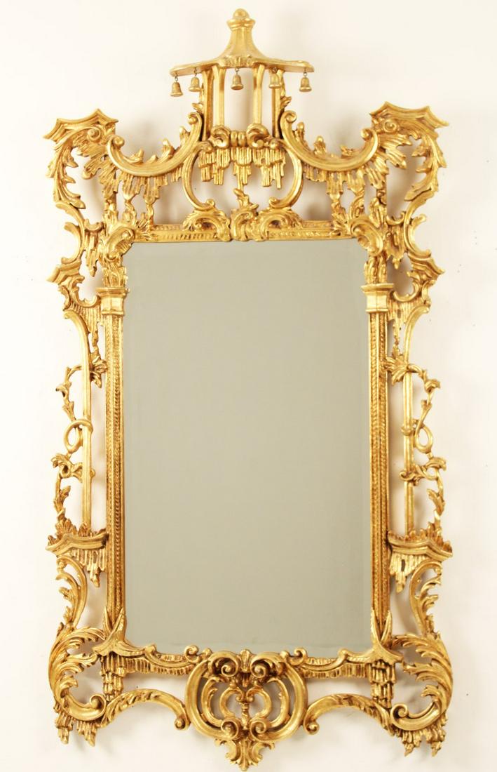 CHINESE CHIPPENDALE STYLE BEVEL GLASS MIRROR BY: CHINESE CHIPPENDALE STYLE GILT CARVED WOOD BEVEL GLASS MIRROR BY FRIEDMAN BROTHERS; 57"H X 32"W
