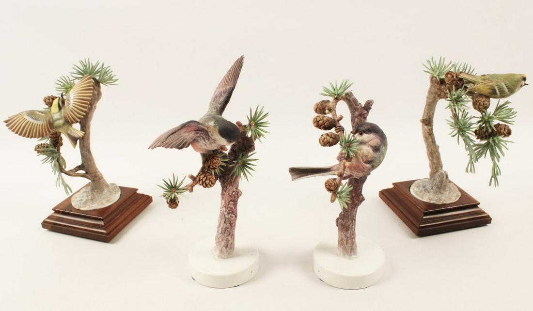 TWO PAIRS OF PORCELAIN BIRD MODELS BY DOROTHY DOUGHTY: TWO PAIRS OF PORCELAIN BIRD MODELS BY DOROTHY DOUGHTY FOR ROYAL WORCESTER INCLUDING CHICKADEES AND GOLDCRESTS; CONDITION: ONE GOLDCREST WITH SEPERATION CRACK AT BASE AND SOME LOSSES TO LARCH NEEDLES; 