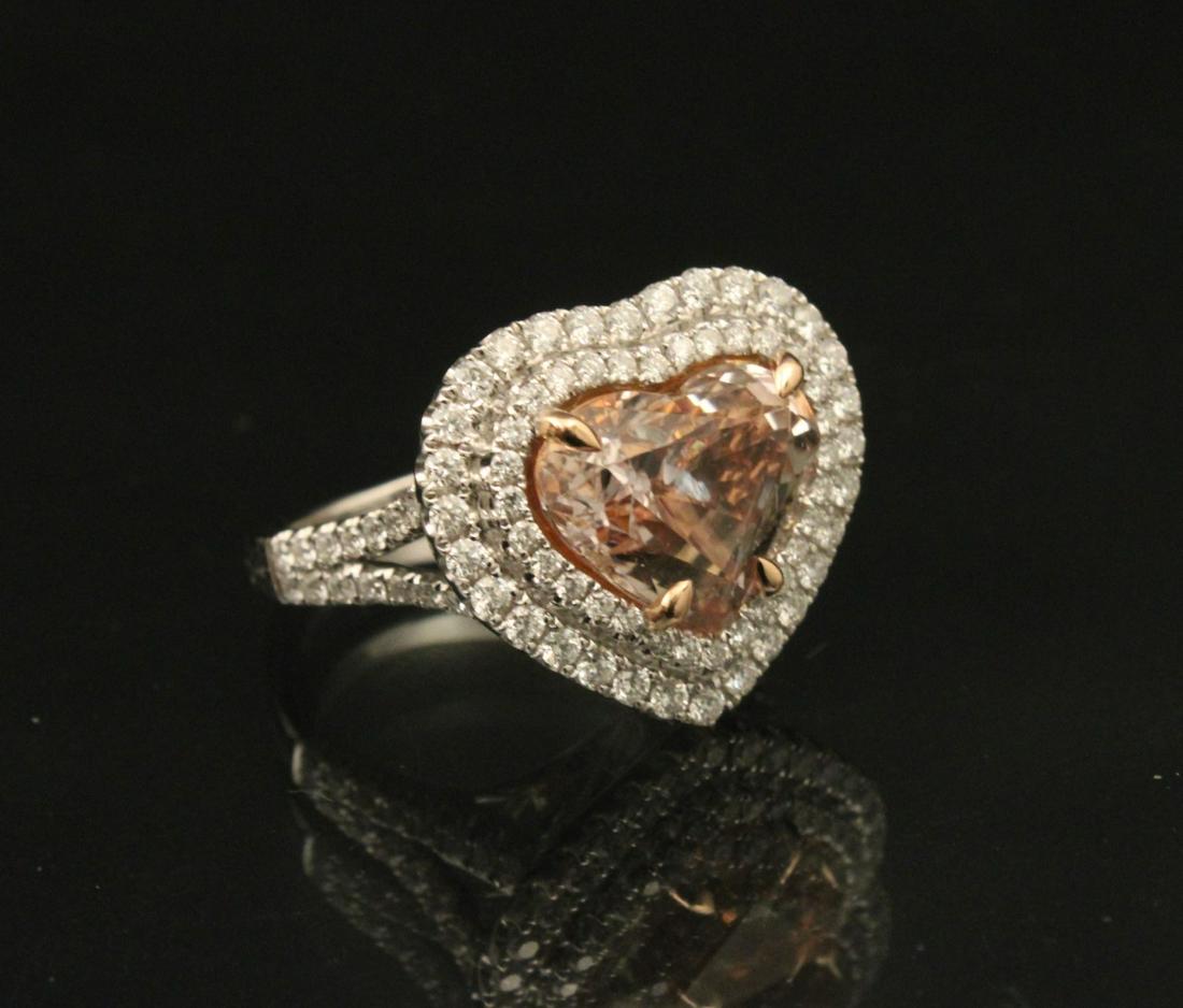 14K WG HEART SHAPED MORGANITE AND DIAMOND LADY'S RING: 14K WHITE GOLD HEART SHAPED MORGANITE AND DIAMOND LADY'S RING; CENTER STONE APPROX. 4.0 CT AND 0.75 CTW DIAMONDS; SIZE 6.25