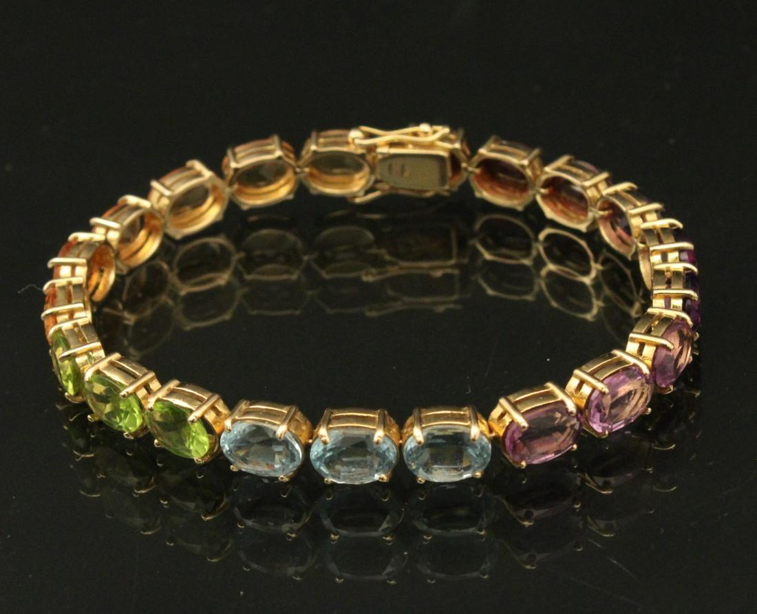 14K MULTICOLORED SEMI-PRECIOUS STONE MTD BRACELET; 19.3: 14K MULTICOLORED SEMI-PRECIOUS STONE MOUNTED BRACELET; 7" LONG; 6 X 8MM OVAL STONES; 19.3 GRAMS
