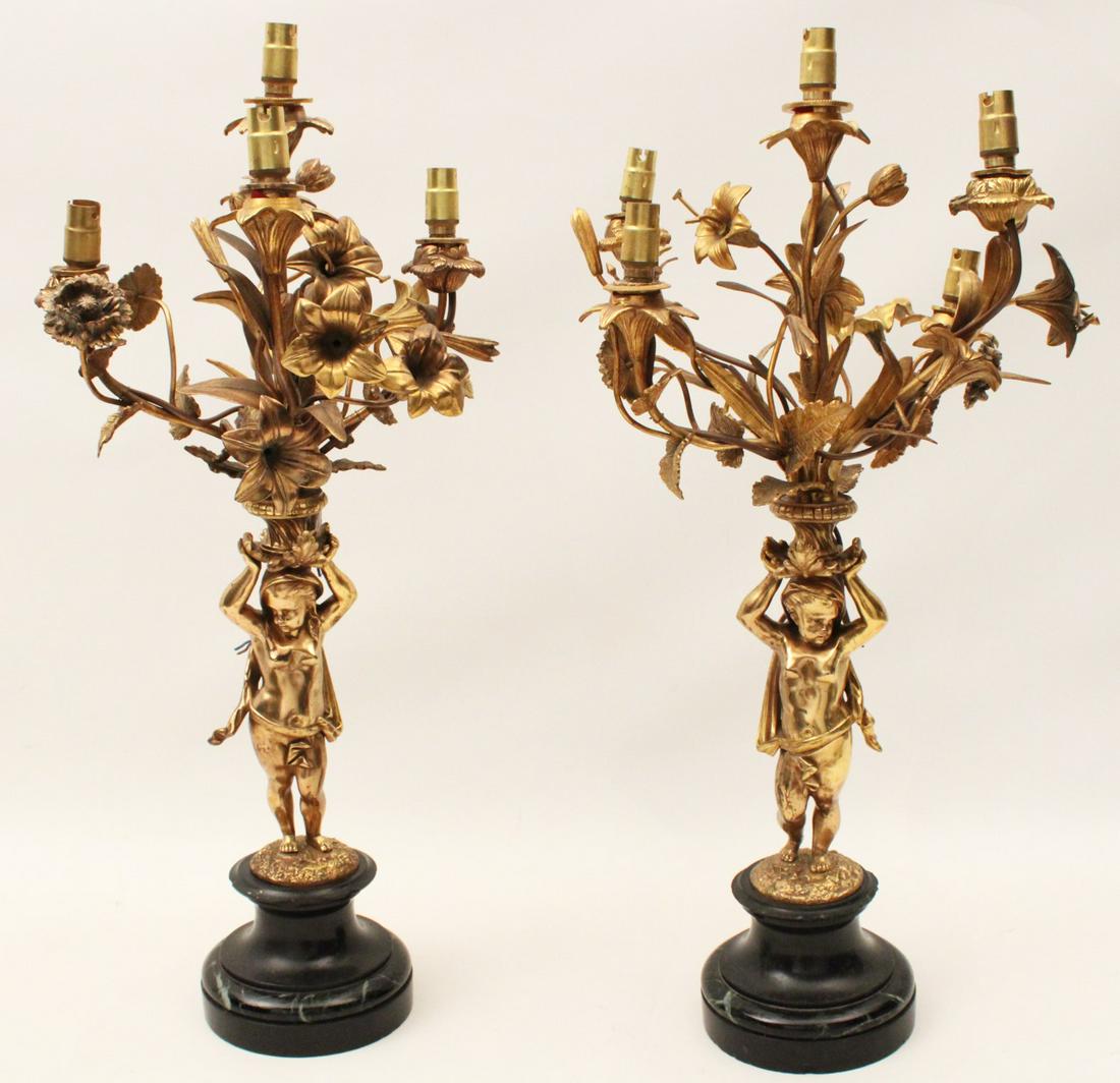 PR OF FRENCH DORE BRONZE 5 LIGHT CANDELABRA: PAIR OF FRENCH DORE BRONZE 5 LIGHT CANDELABRA SUPPORTED BY PARTIALLY CLAD COUPLE RESTING ON BLACK MARBLE PEDESTAL, LATE 19TH C.; EUROPEAN WIRED; 23"H