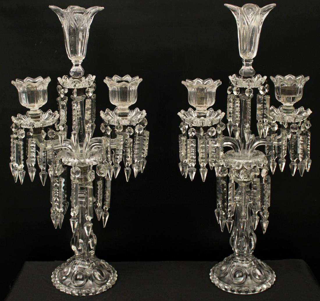 PR. OF FRENCH BACCARAT CRYSTAL 3 LIGHT CANDELABRA: PAIR OF FRENCH BACCARAT CRYSTAL 3 LIGHT CANDELABRA, UNMARKED; 23"H X 11"W; CONDITION: CHIP TO BOTTOM UNDERSIDE FOOT; 2 SMALL PRISMS MISSING POINTED DIAMOND TIPS; SEVERAL WITH CHIPS TO DIAMOND TIPS; ON