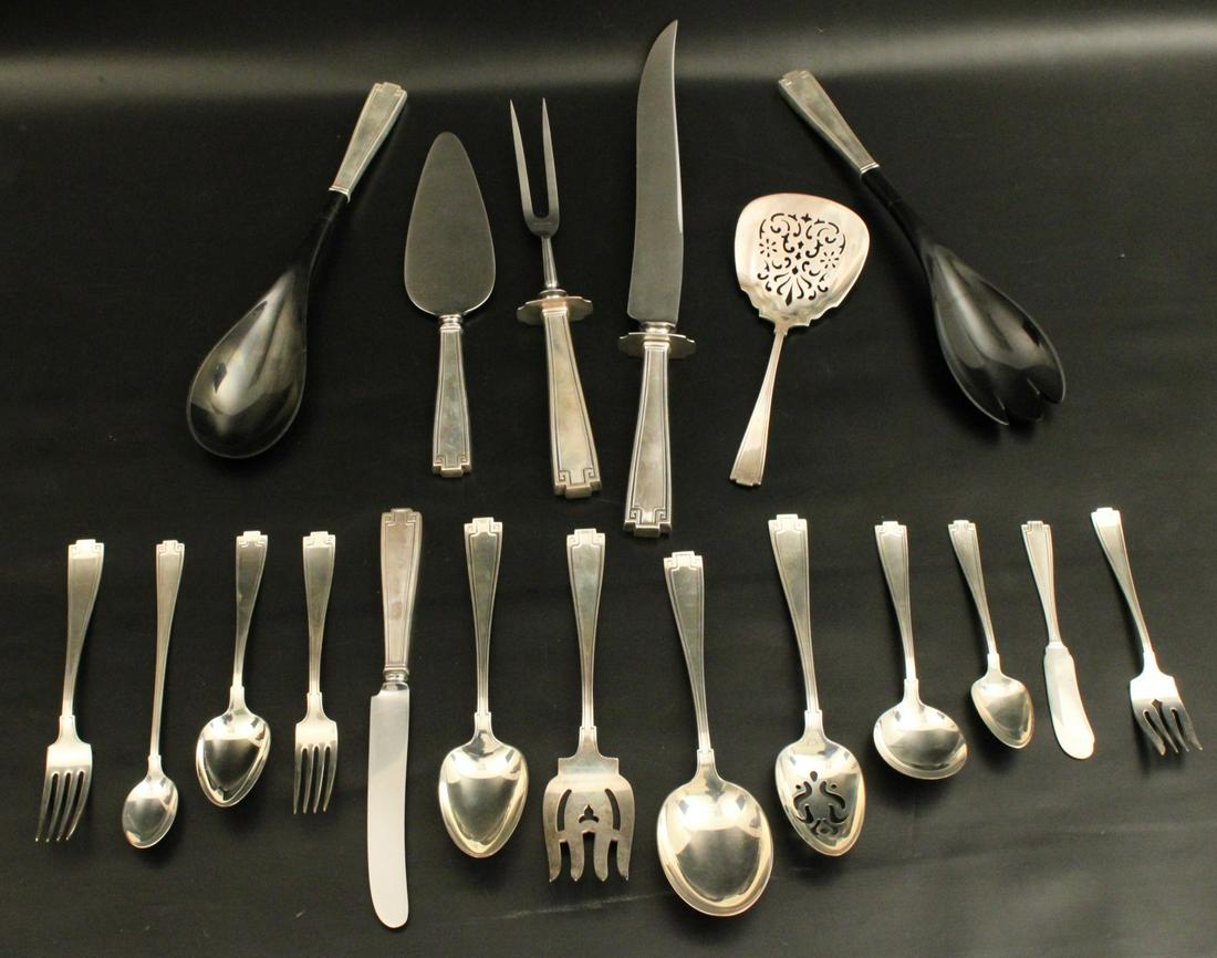 115 PC. ETRUSCAN PATTERN S/S FLATWARE; 123 TOW: 115 PC. ETRUSCAN PATTERN STERLING SILVER FLATWARE BY GORHAM CONSISTING OF 12-9.5" DINNER KNIVES, 12-7.5" DINNER FORKS, 12 SALAD FORKS, 6 LUNCHEON FORKS, 4 GRAND SERVING SPOONS (ONE RETICULATED), 5 BUT